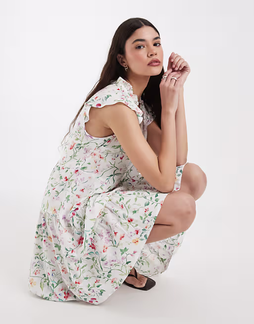 Vero Moda ruffle trim babydoll mini dress in white floral print