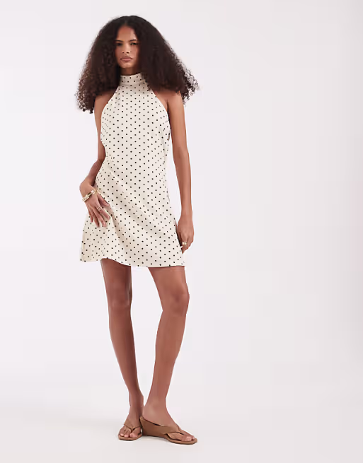Vero Moda halter neck polka dot mini dress in cream and black