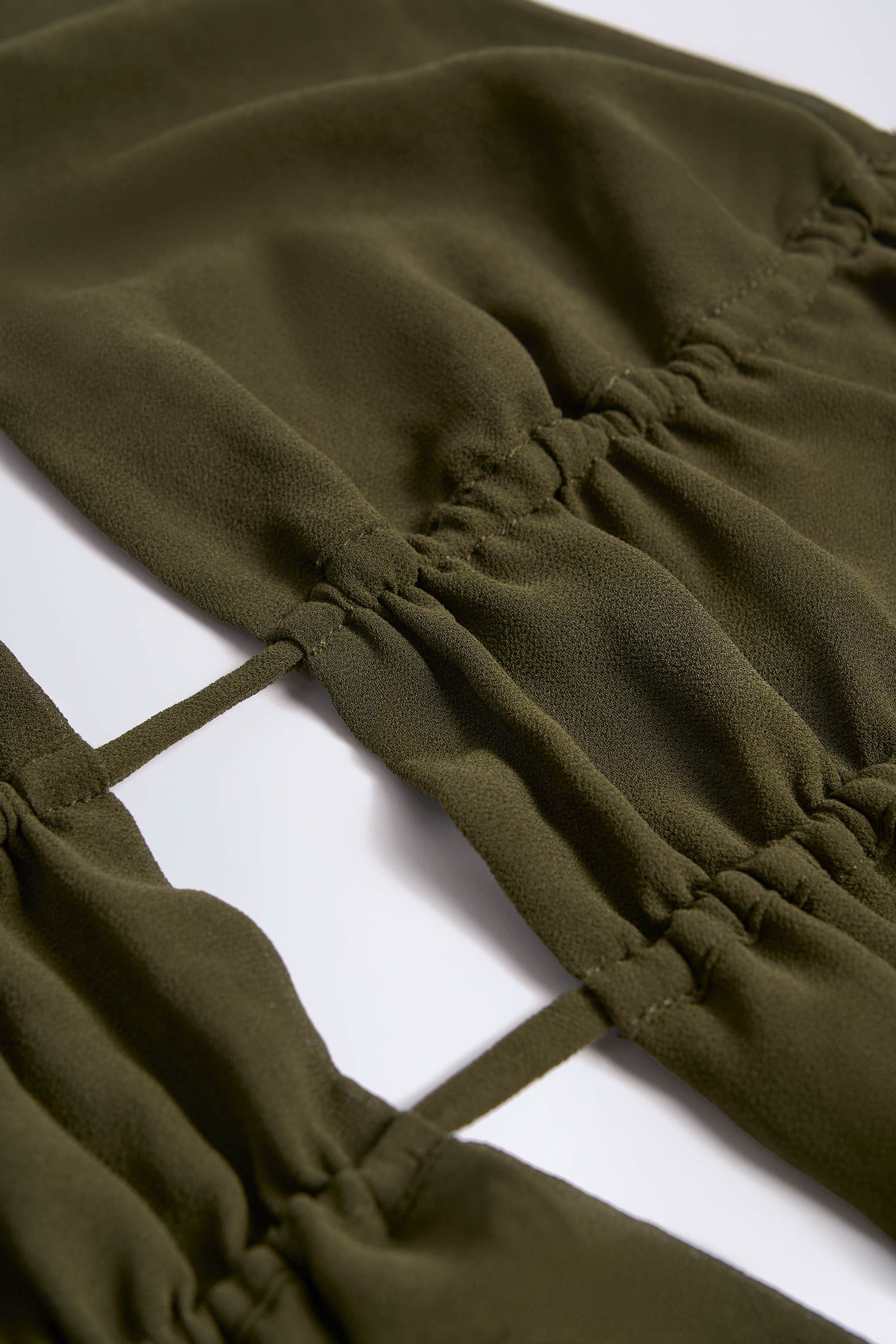Cut-Out Semi-Sheer Ruched Halterneck Crop Top in Dark Khaki