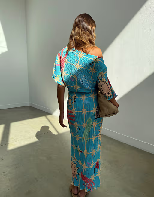 Never Fully Dressed Tilly off shoulder plisse maxi dress in blue celestial print