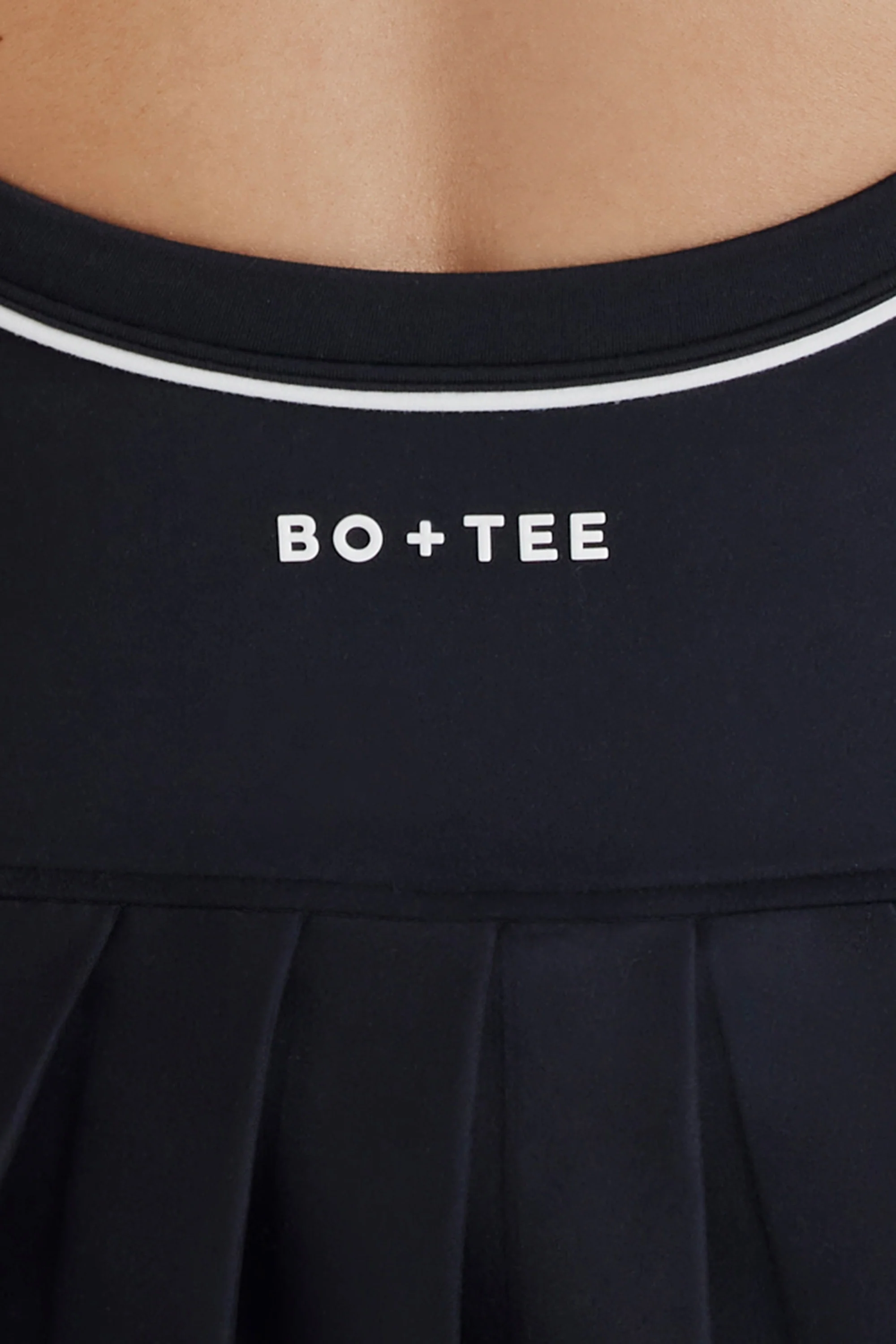 Soft Active Crossback Pleated Tennis Dress in Black