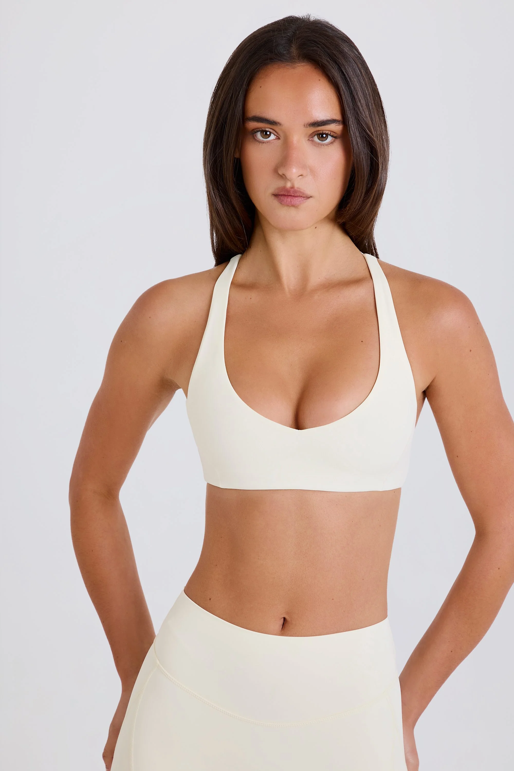 Four-Way Stretch Crossback V-Neck Sports Bra in Cream