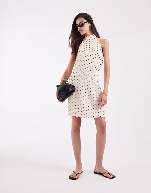 Vero Moda Tall halter neck polka dot mini dress in cream and black