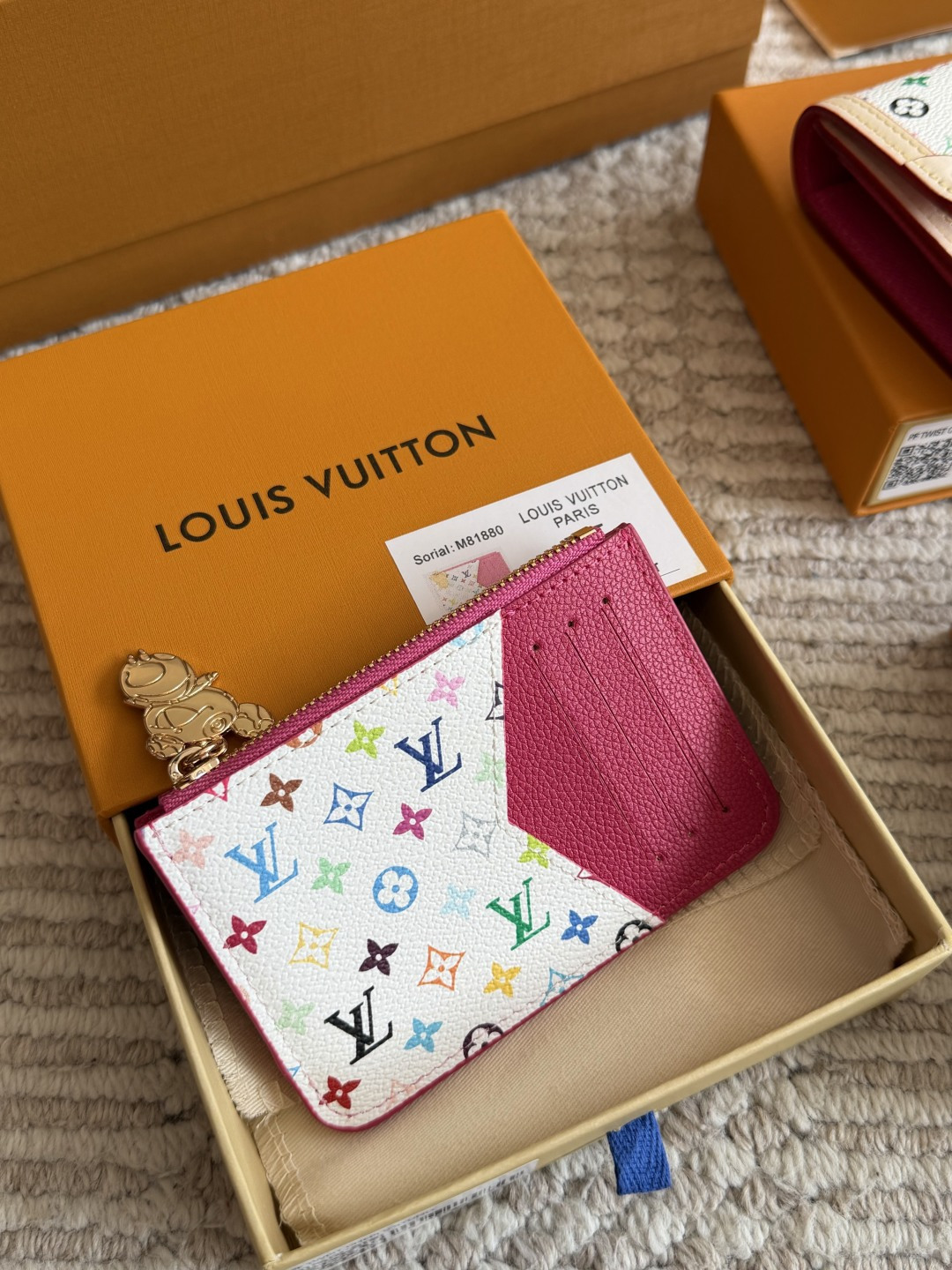 Louis Vuitton Multicolor Leather Wallet with Zipper Closure and Keychain Attachment (Replica)