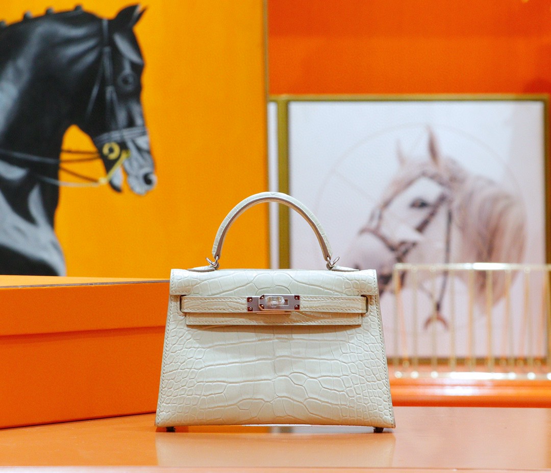 Hermes Minikelly 2nd generation, matte crocodile skin, cream white, silver buckle, 19cm