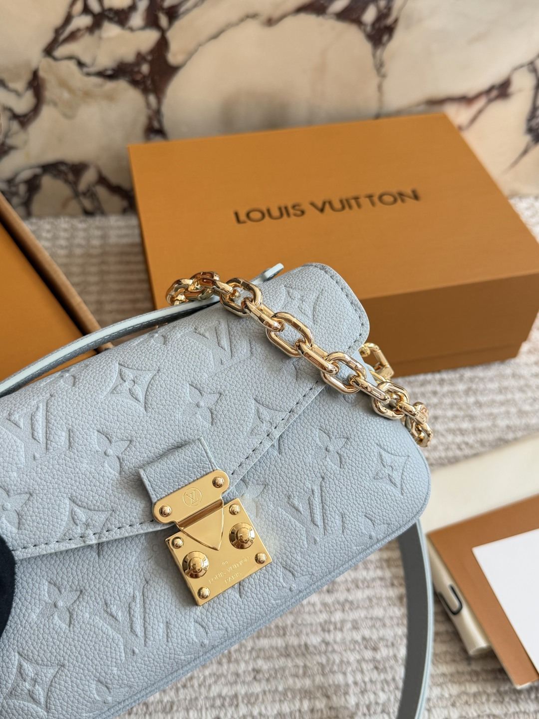 Louis Vuitton Metis Pochette Light Blue Leather Bag with Gold-tone Hardware (Replica)