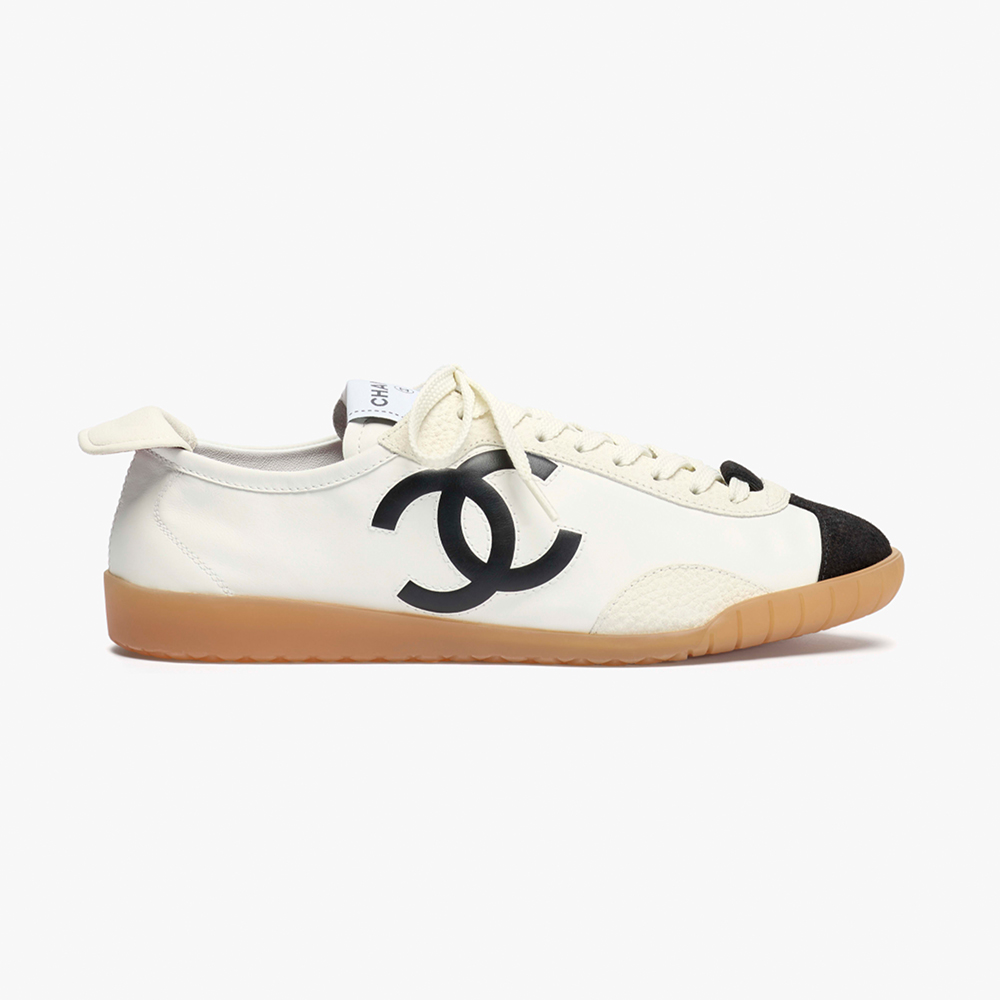 Chanel black Shoes Chanel Sneakers Calfskin Embossed Suede Calfskin Black White View 2 | Nigo Office