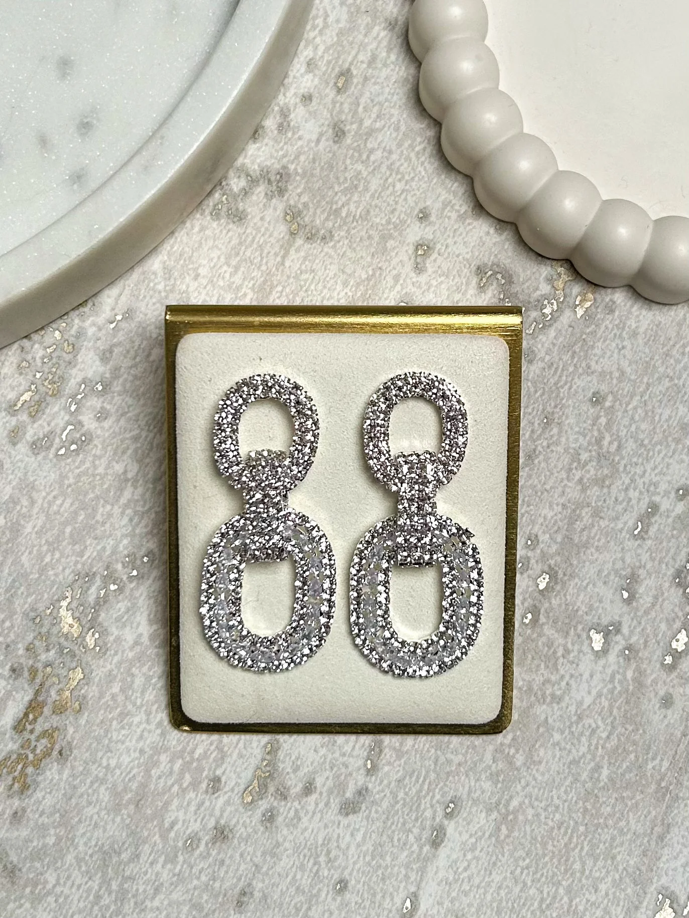 Diamante Oval Intertwined Dangle Earrings