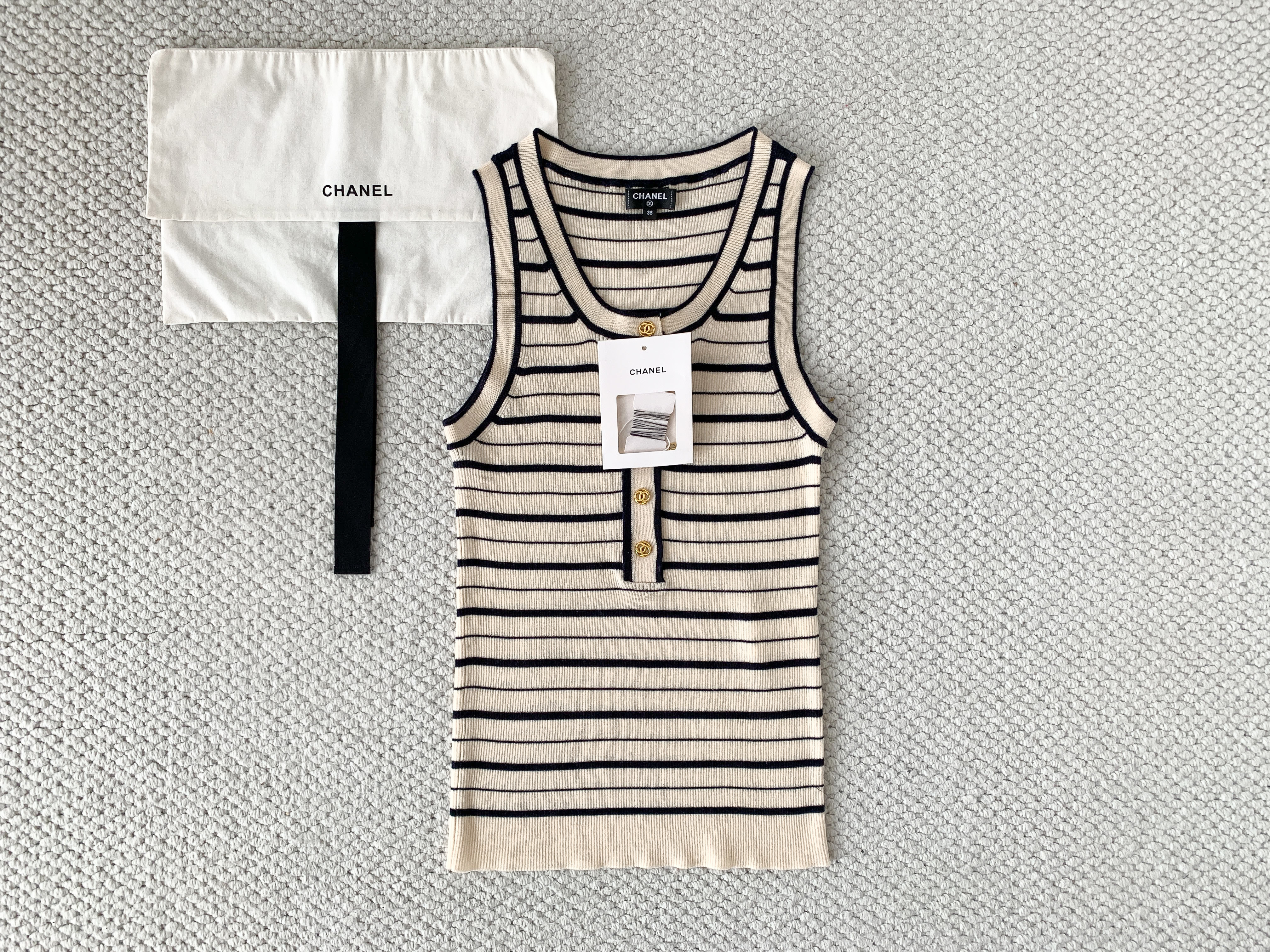 Chanel black Clothing Chanel Black and White Striped Buttoned Round Neck Knitted Vest #390242 View 2 | Nigo Office