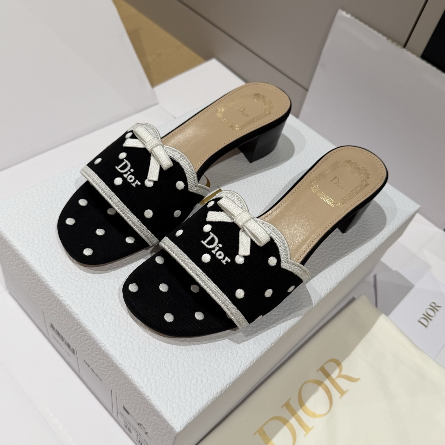 Dior black Shoes DIOR Dway Slide White Cotton Embroidered with Black PolkaDior Motif #395842 View 2 | Nigo Office