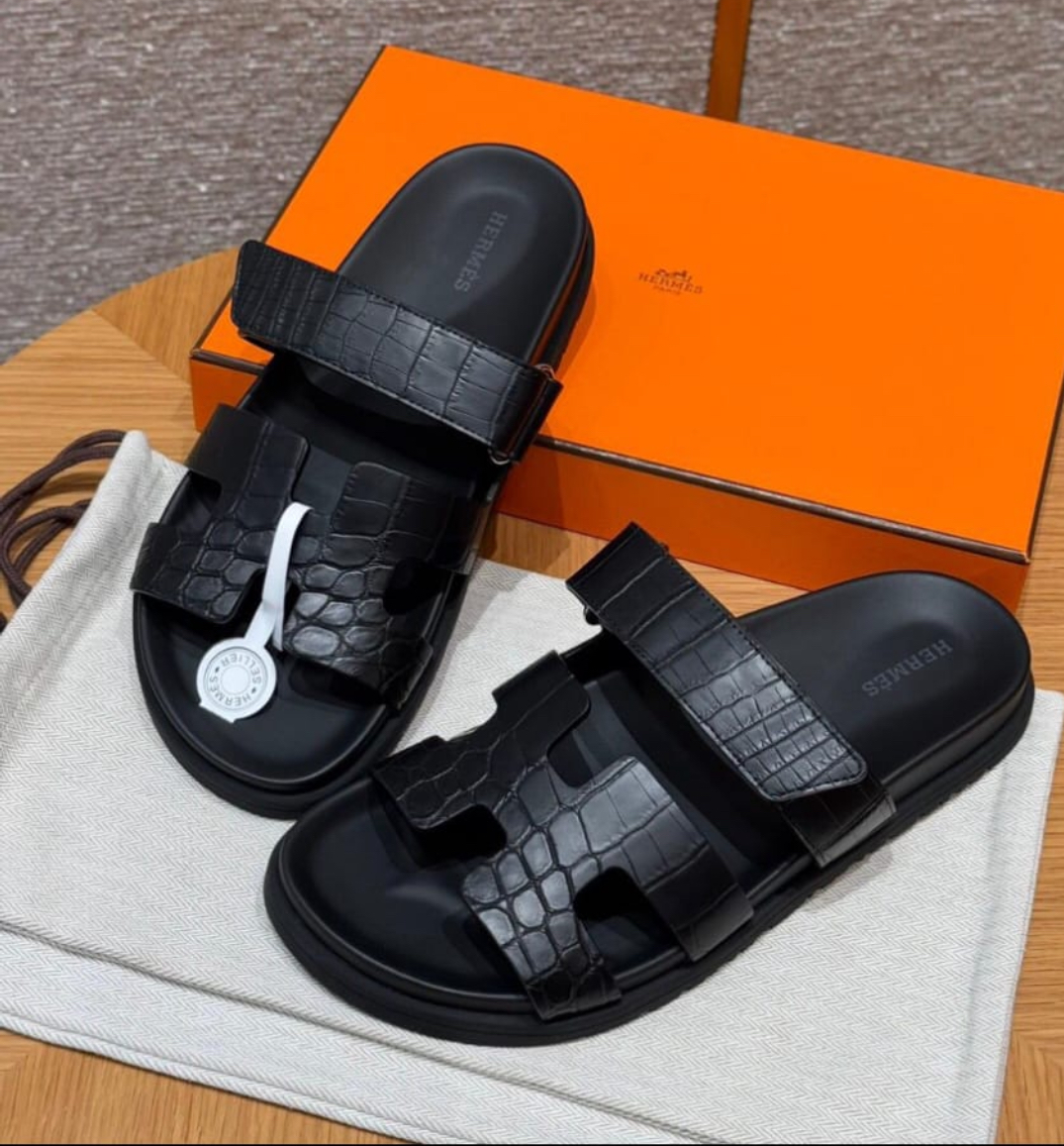 Hermès black crocodile leather slippers