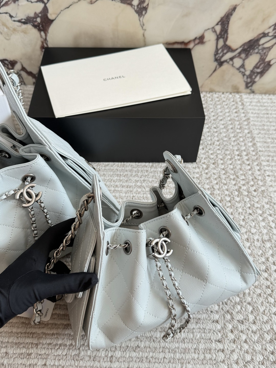 Chanel Light Blue Quilted Hobo Bag with Chain Strap and CC Logo Charm (Replica)