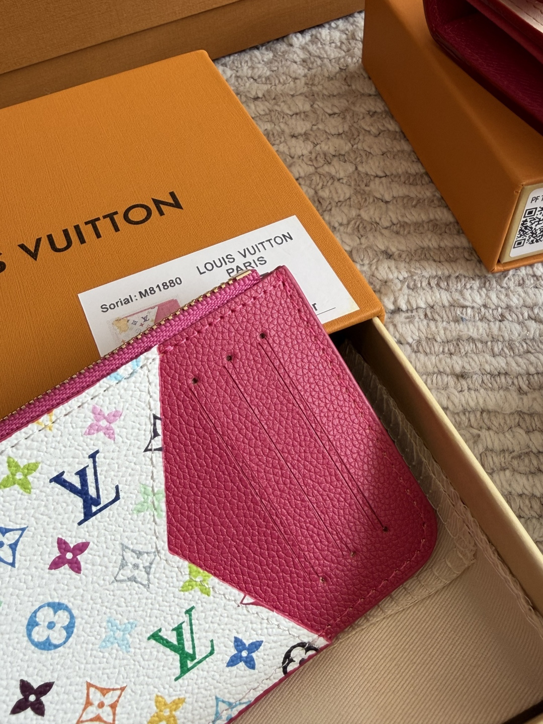Louis Vuitton Multicolor Leather Wallet with Zipper Closure and Keychain Attachment (Replica)