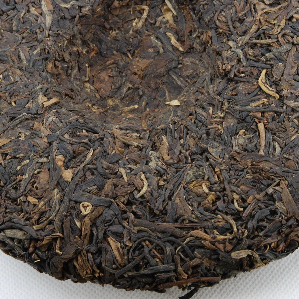 Pu-Erh Tea Cake, Yuenhai Yiwu Mountain Wild Arbor Tea , Year 2003 (Raw/Sheng)€42.95Pu-erh TeamySiteTEAWAVYTEAWAVY