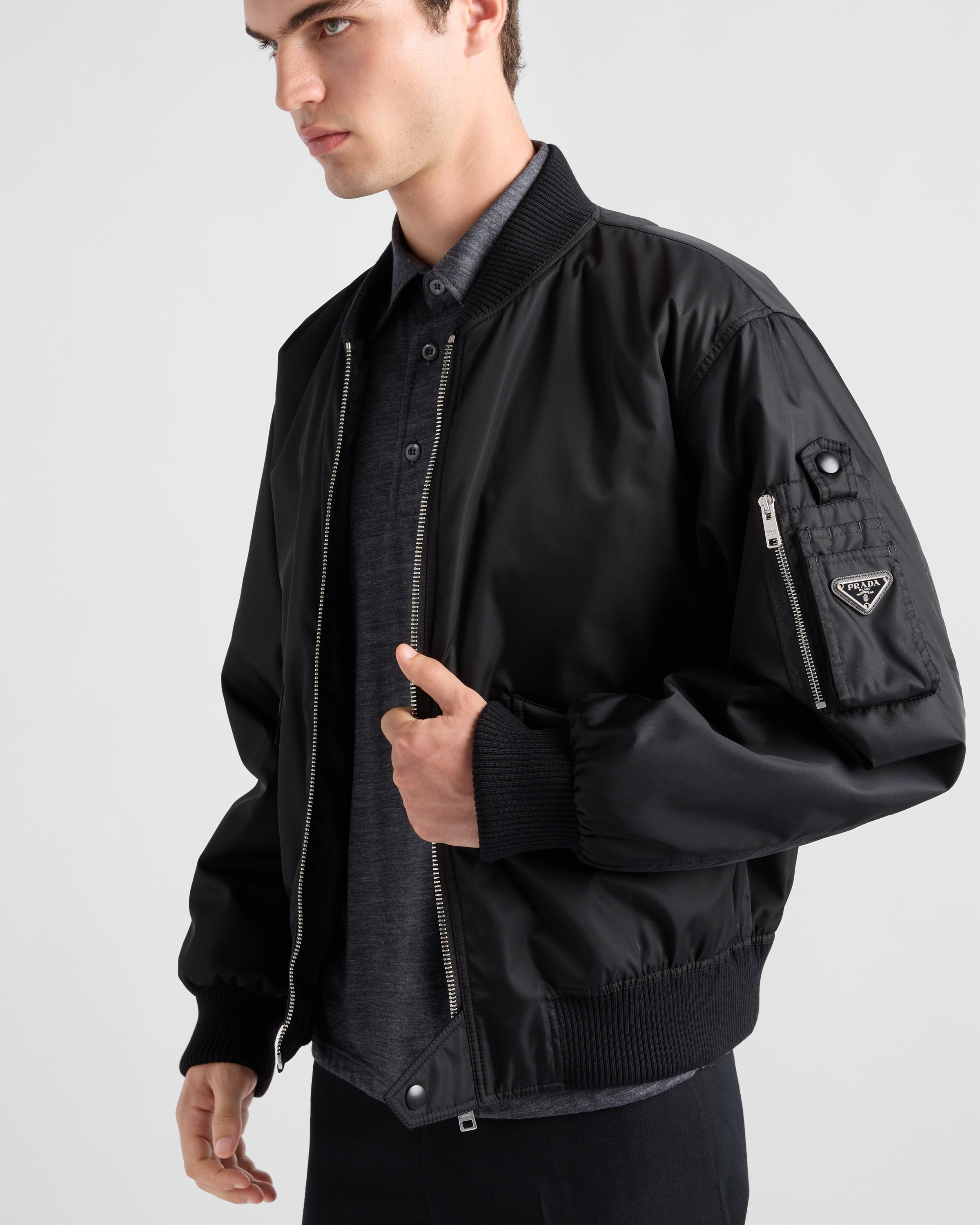 Prada black Clothing PRADA Black Re-nylon Bomber Jacket #389923 View 2 | Nigo Office