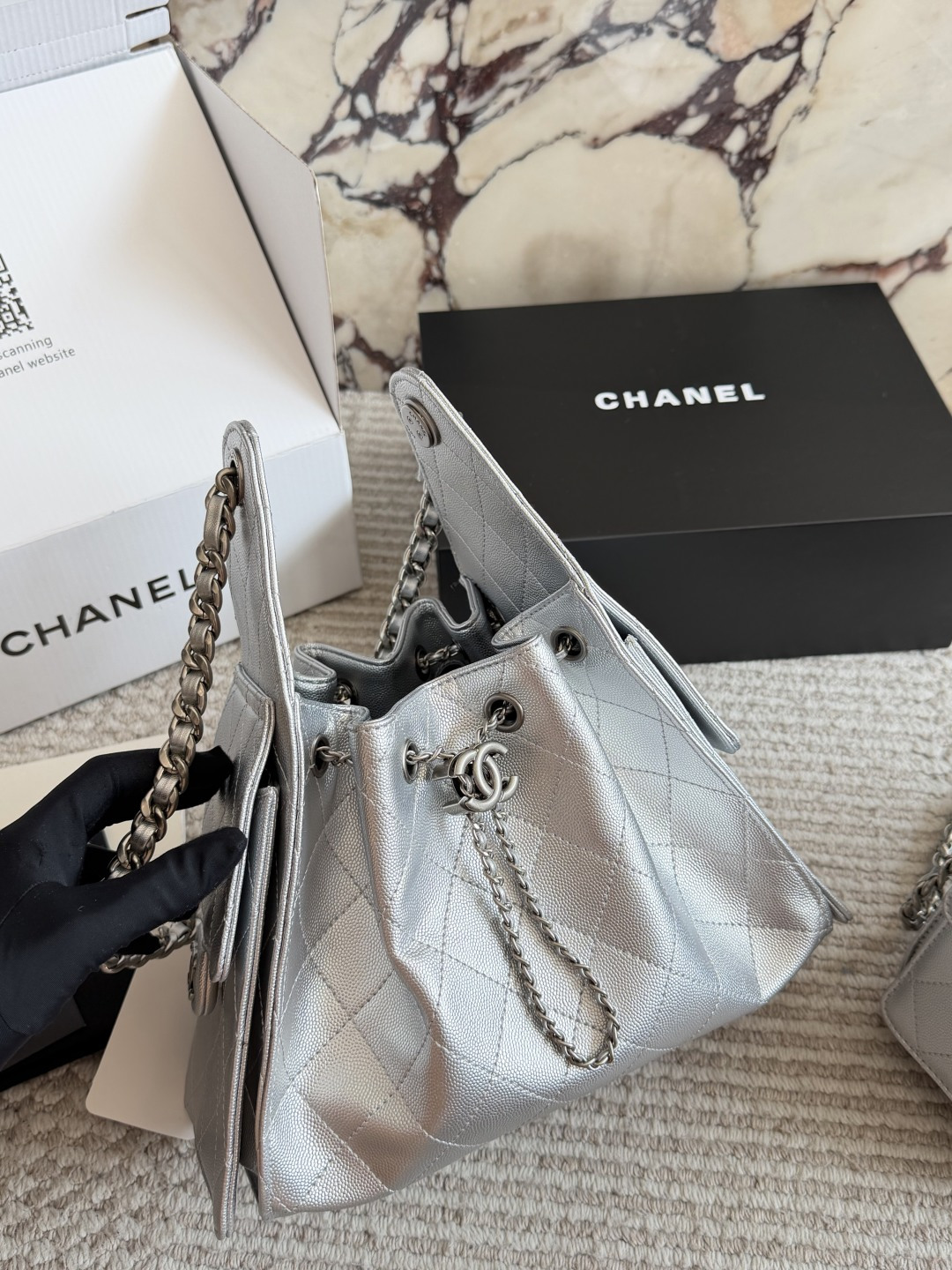 Chanel Silver Quilted Hobo Bag with Chain Strap and CC Logo Charm (Replica)