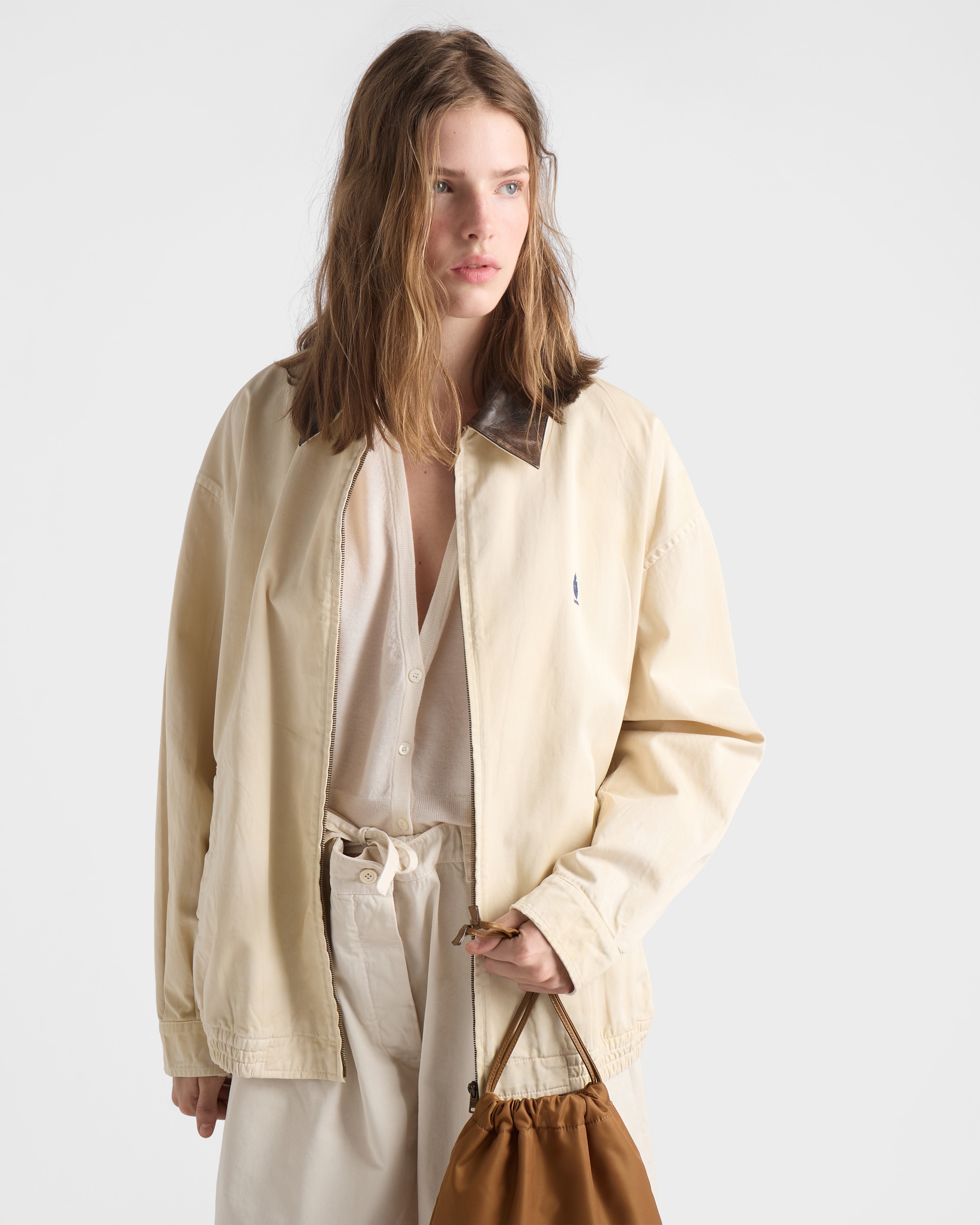 Prada beige Clothing PRADA Sand Beige Embroidered Garment-dyed Old Gabardine Blouson Jacket #394612 View 2 | Nigo Office