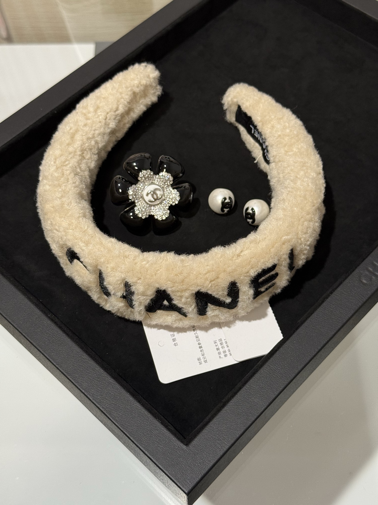 Chanel black Accessory Chanel White Plush Black Woven Wire Letter Headband Hairpin View 2 | Nigo Office