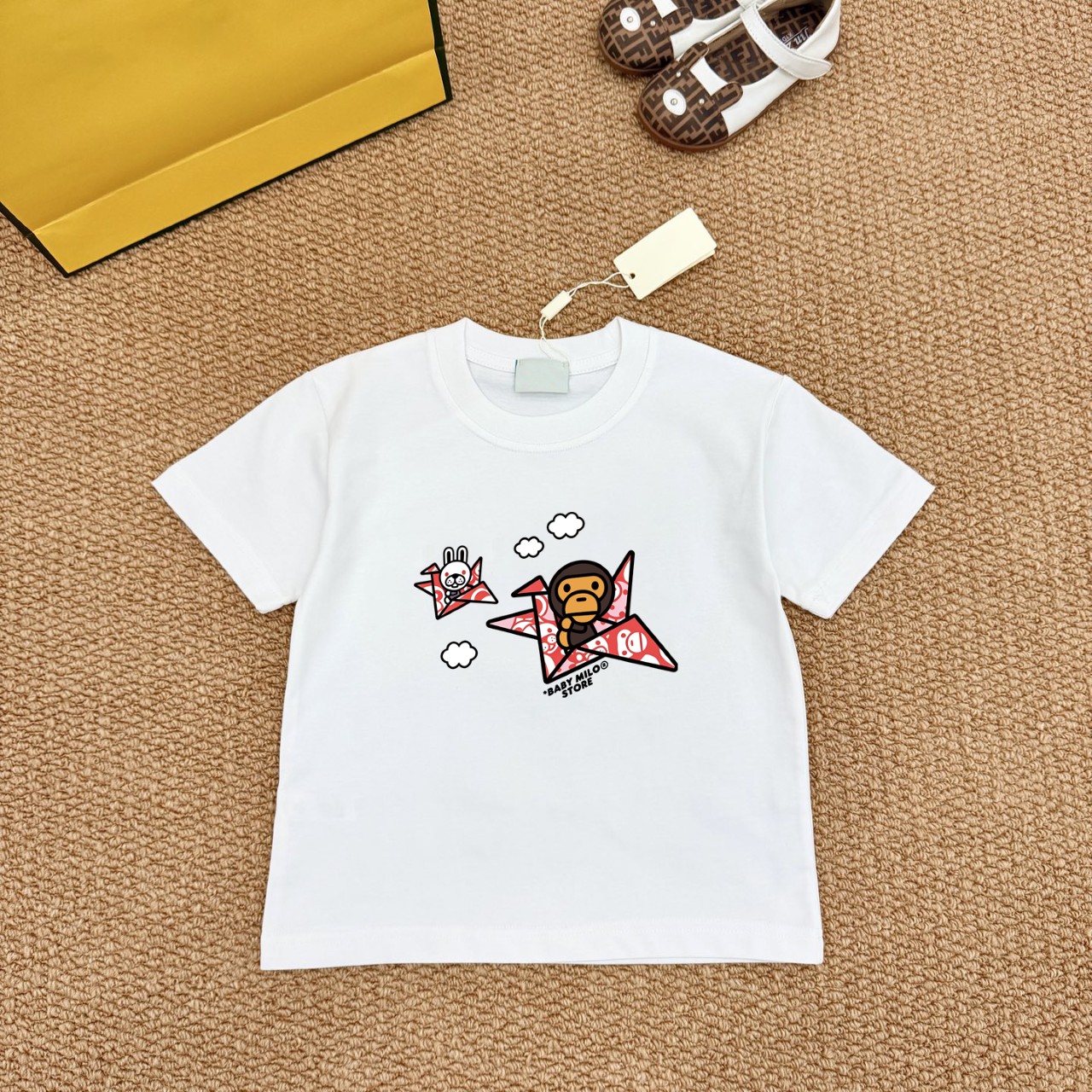 Bape Unisex Kids Cartoon Baby Milo Origami Paper Plane Graphic Short Sleeve T-Shirt Boys Girls Sizes 90-150