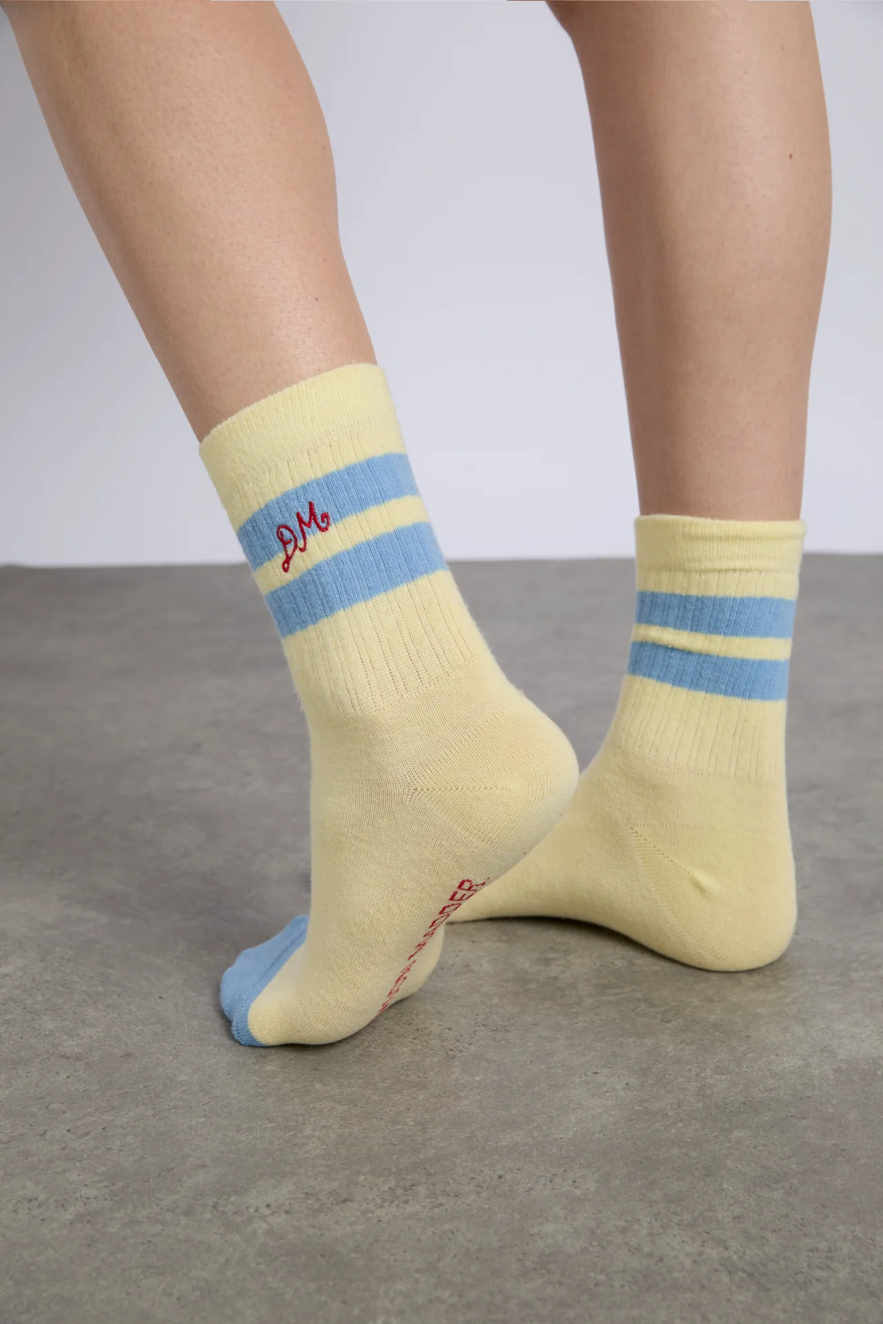sporty calf length socks in yellow and blue