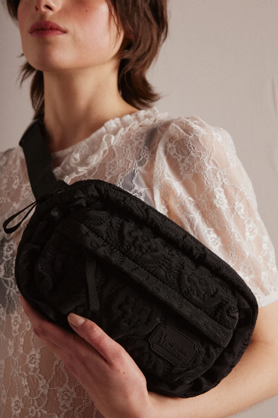 frill cross body bag in black floral stitch