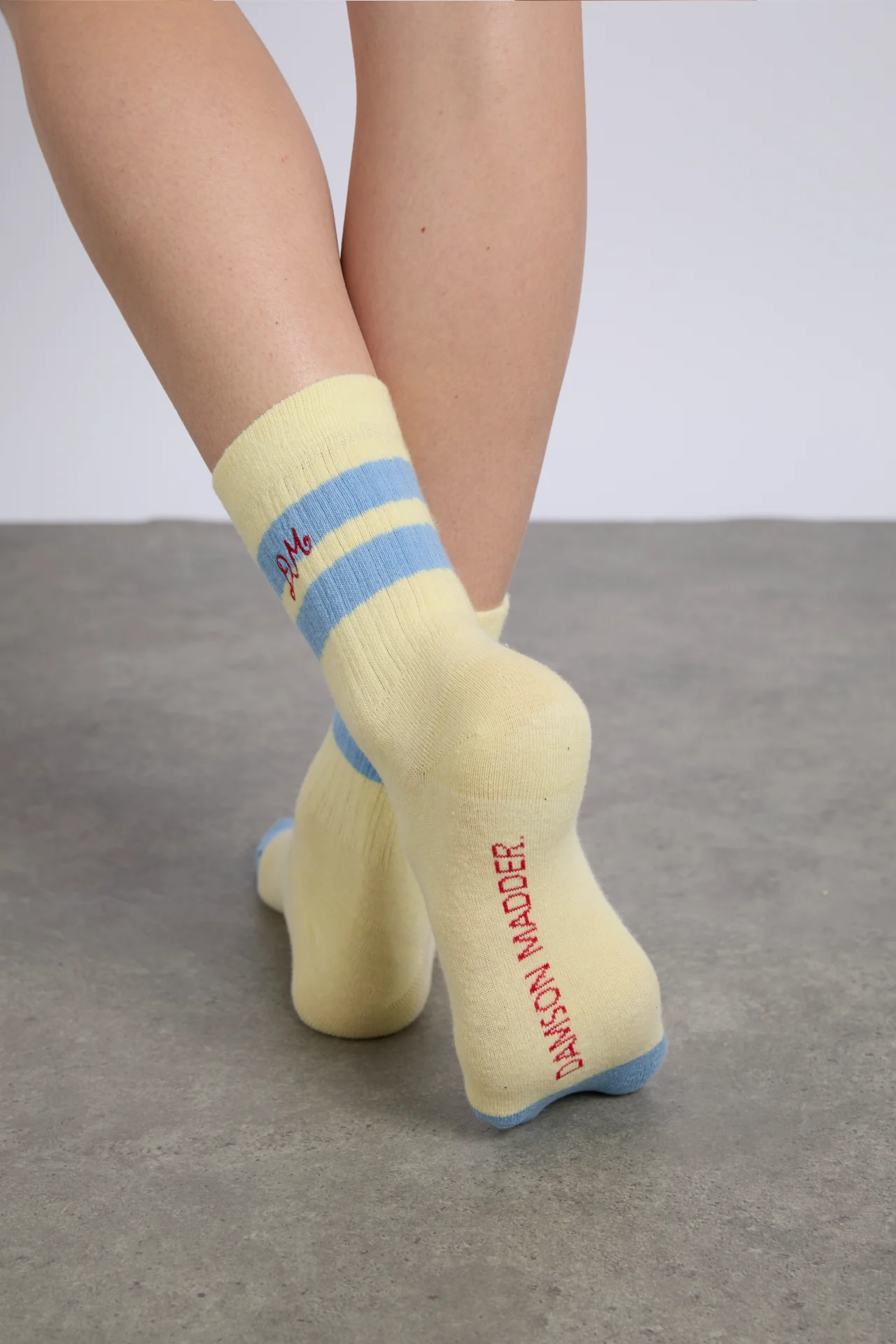 sporty calf length socks in yellow and blue