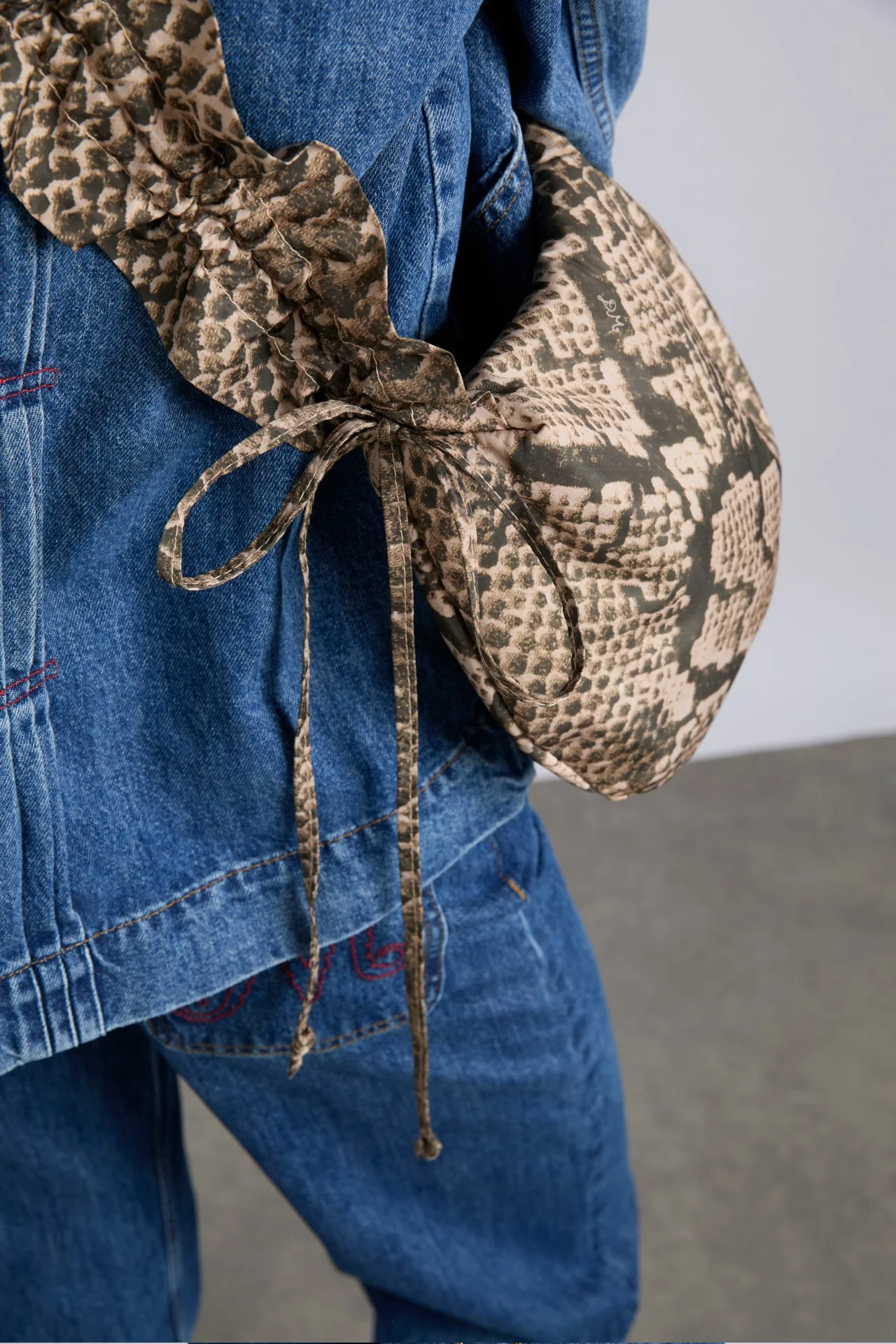 ruched kidney bag in snake print
