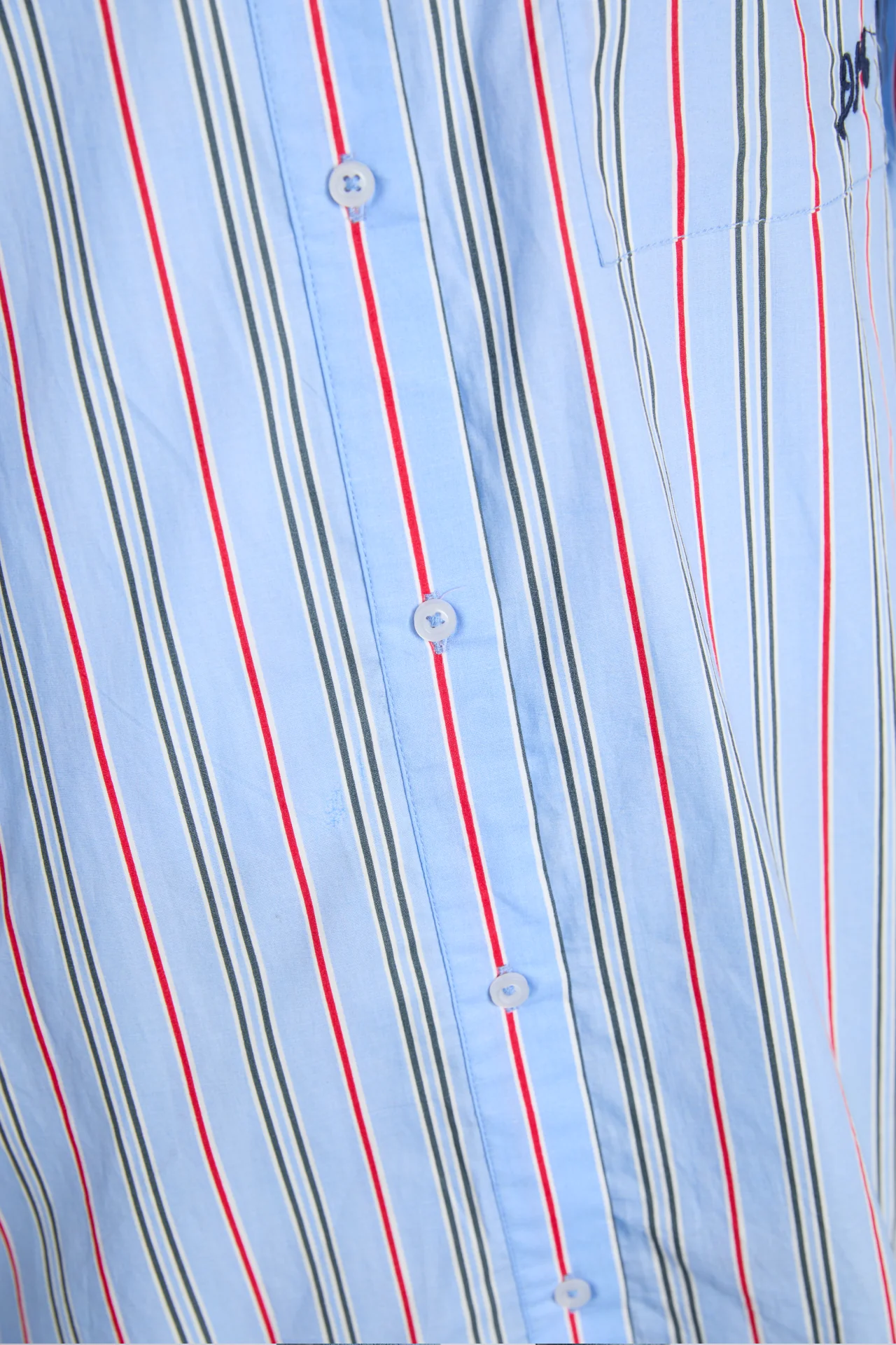 kendall ruffle shirt- bold blue stripe