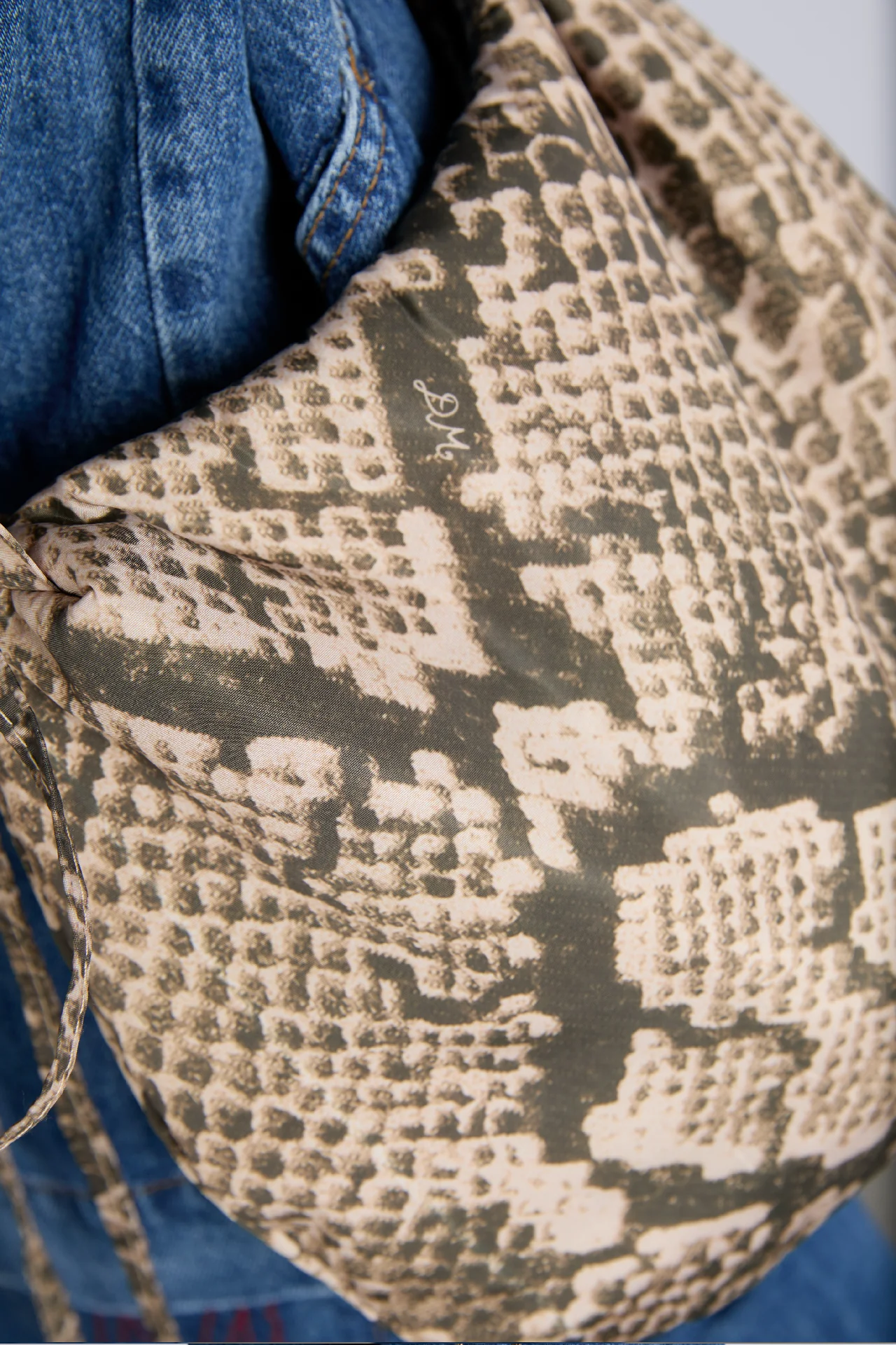 ruched kidney bag in snake print