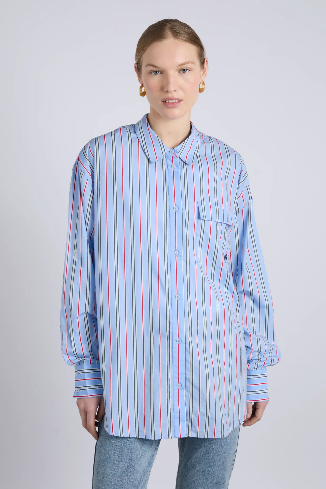 kendall ruffle shirt- bold blue stripe