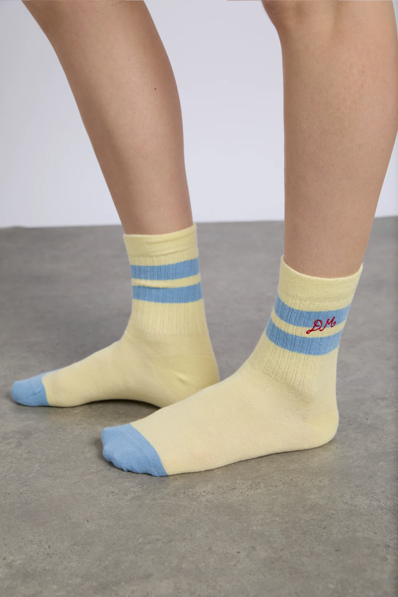 sporty calf length socks in yellow and blue