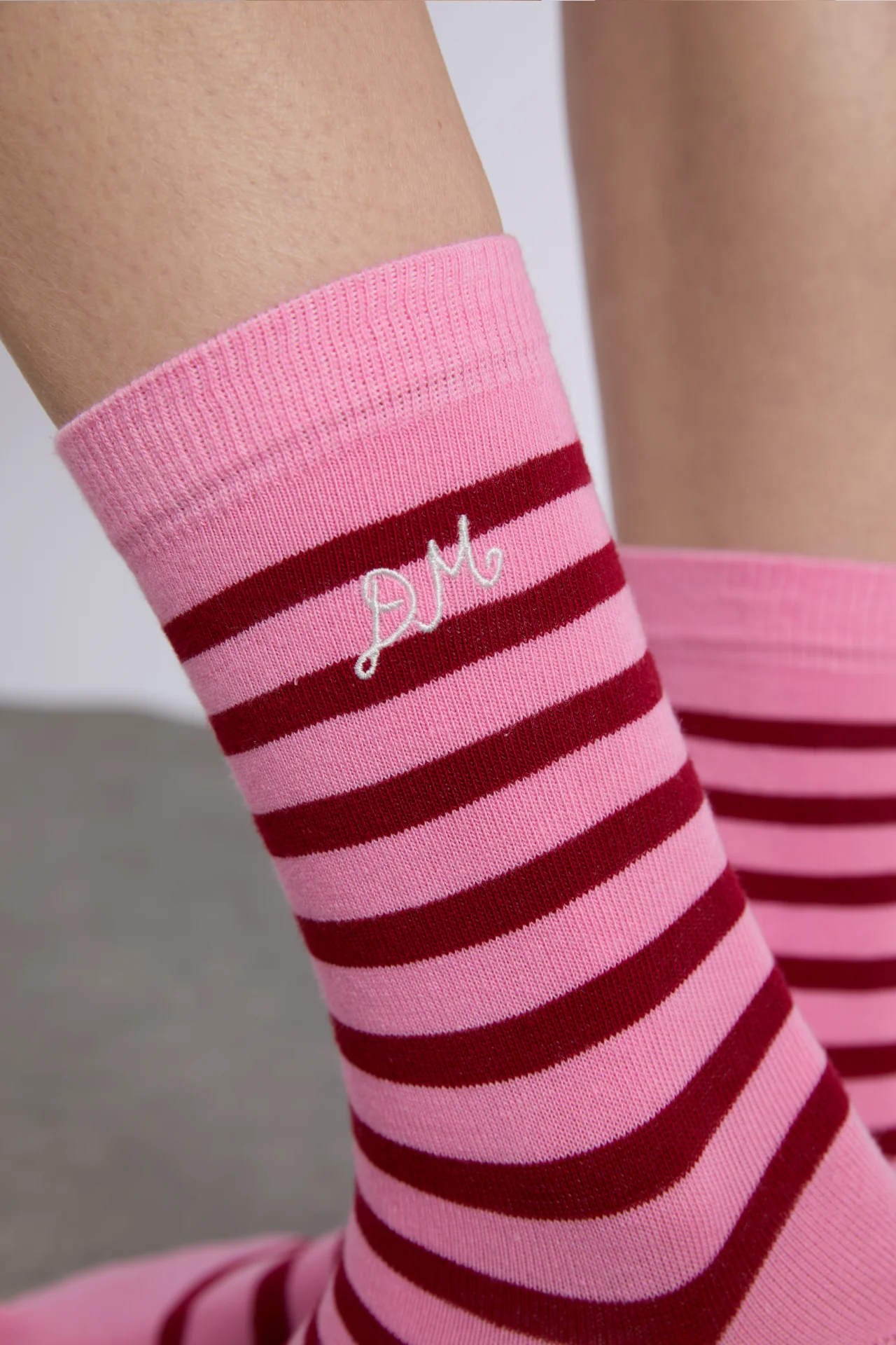 calf length socks in pink and red stripe