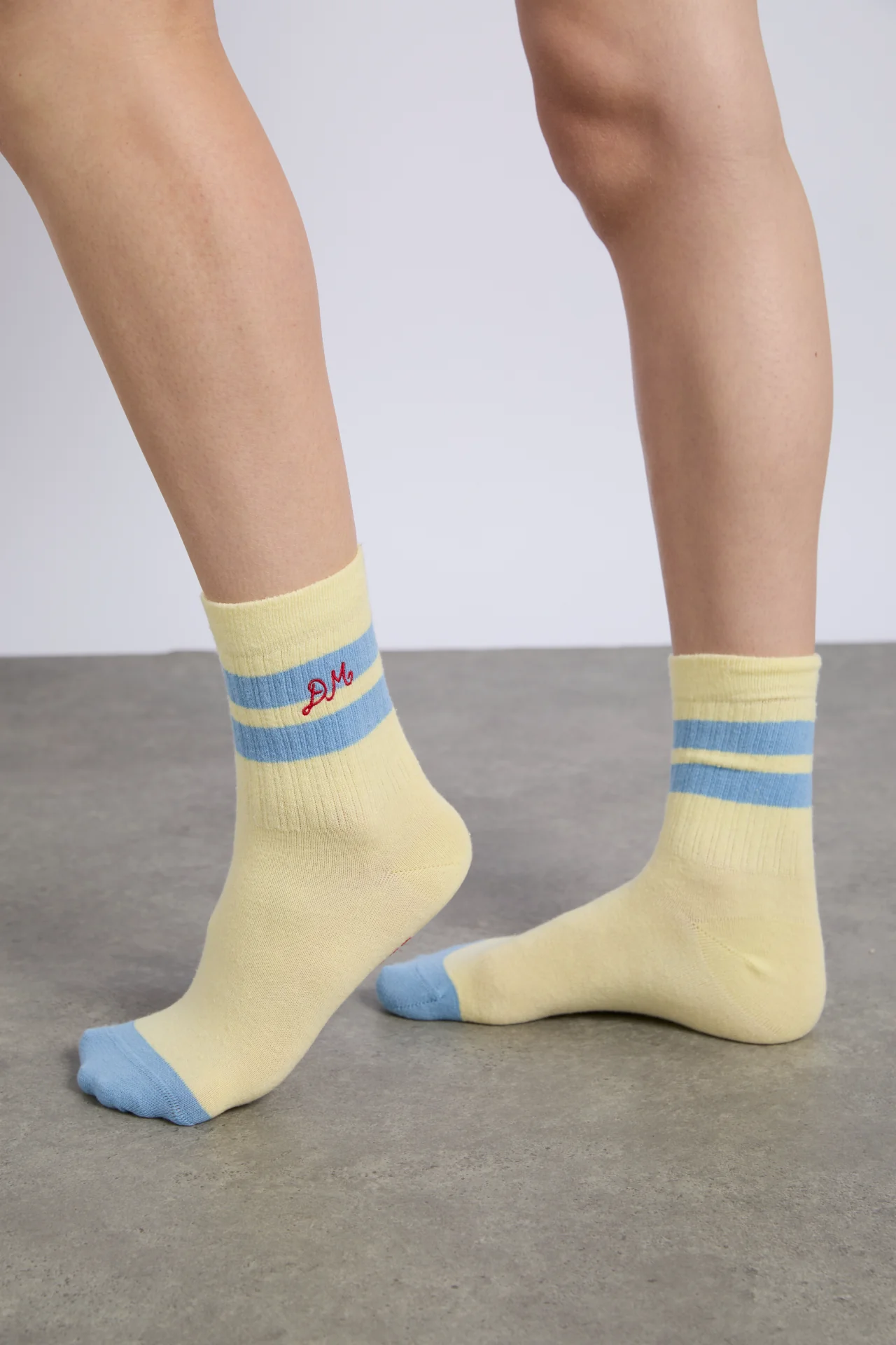 sporty calf length socks in yellow and blue