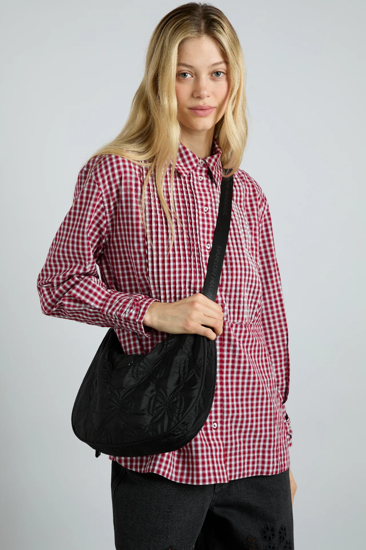 crescent bag with bow stitch detail