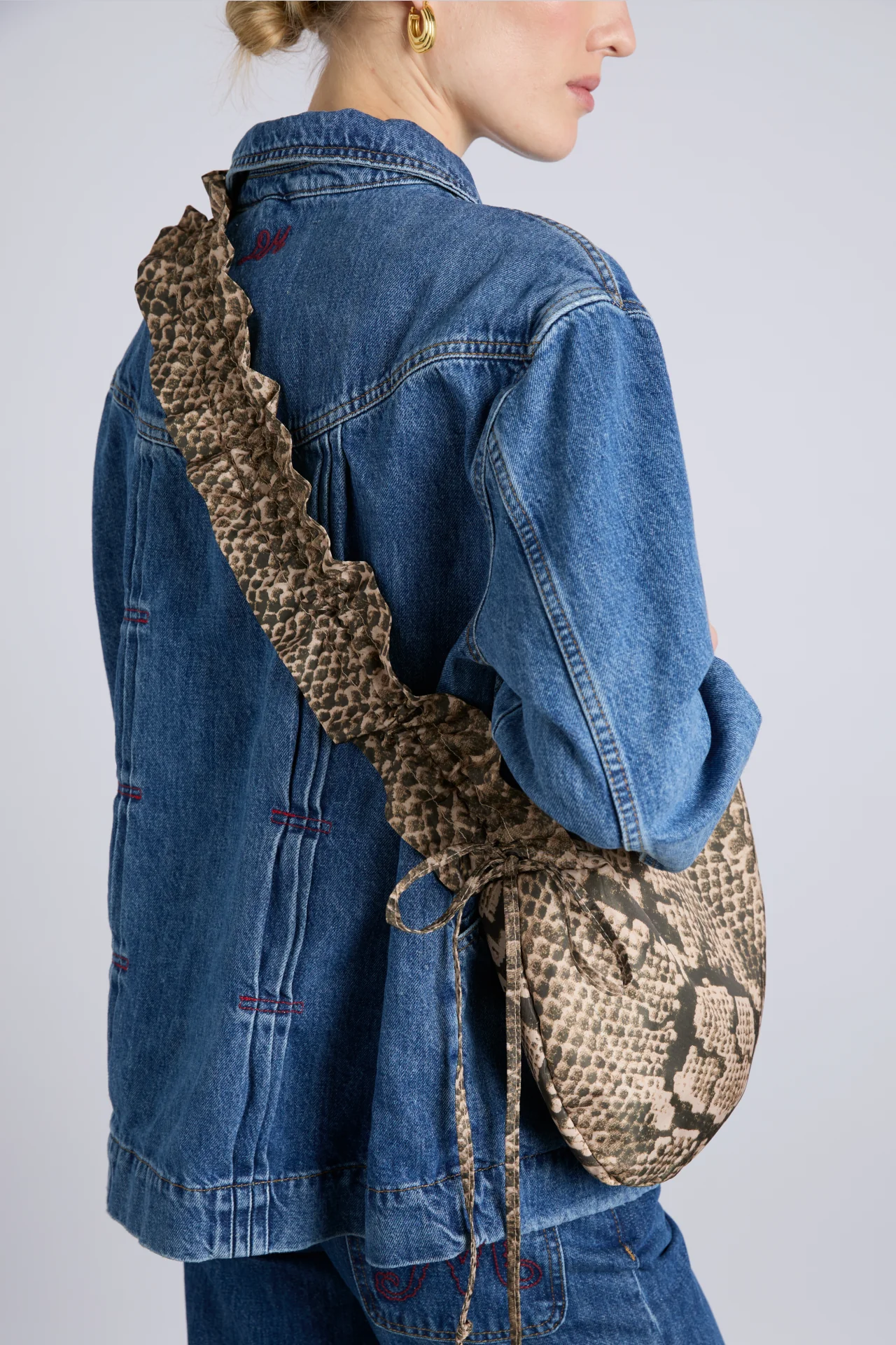 ruched kidney bag in snake print