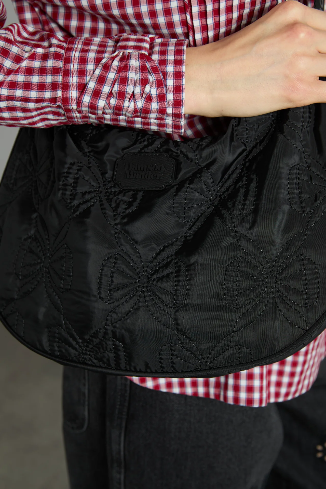 crescent bag with bow stitch detail