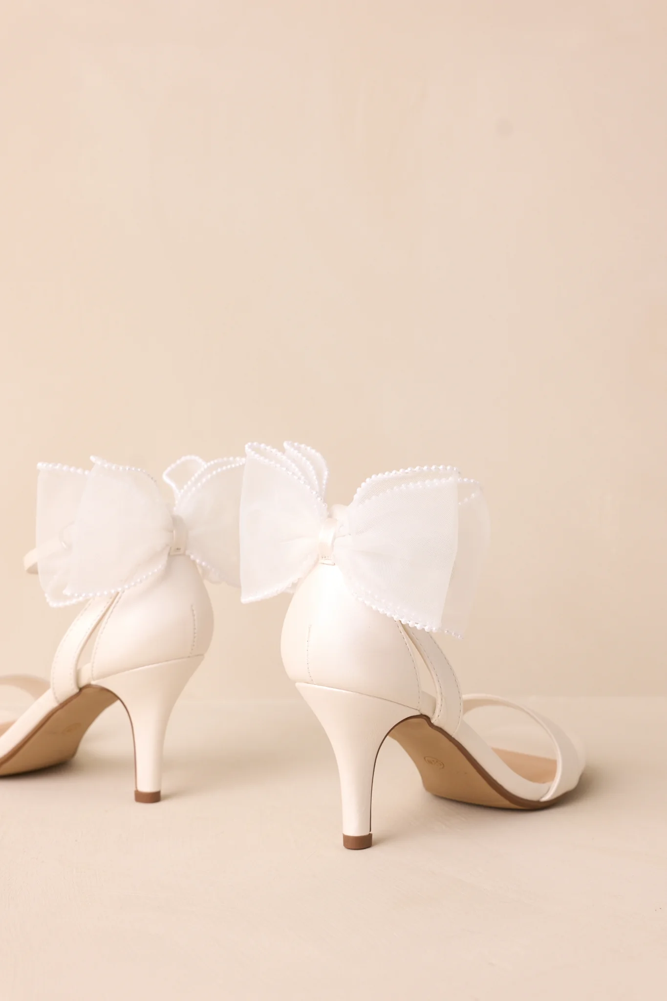 Follow Your Heart Ivory Satin Bow Back Kitten Heels