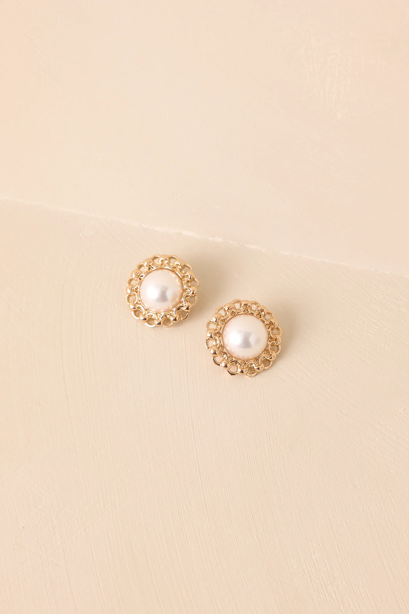The Final Thought Gold Ivory Pearl Stud Earrings