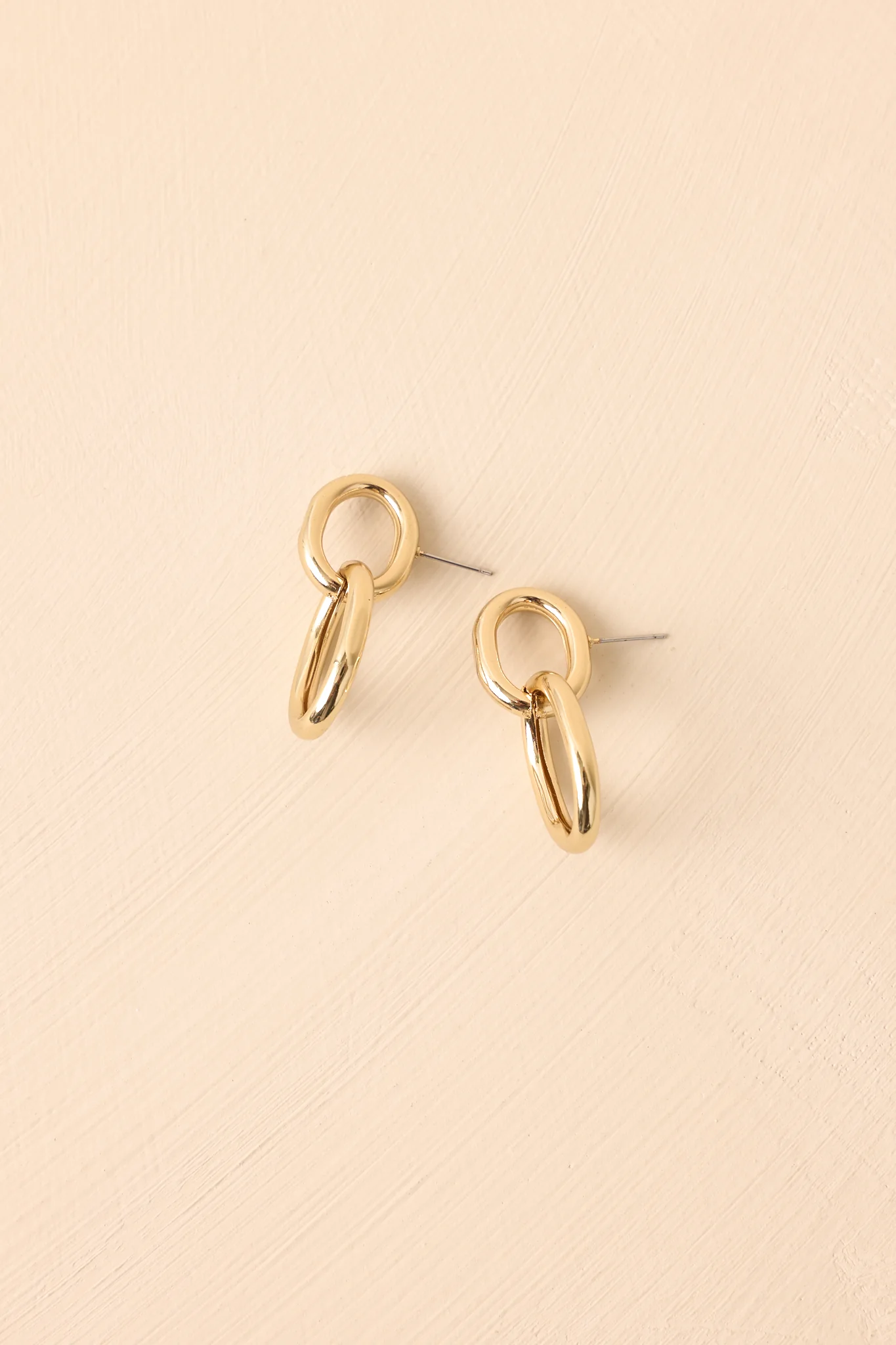 Dressed For The Drama Gold Interlocking Drop Earrings