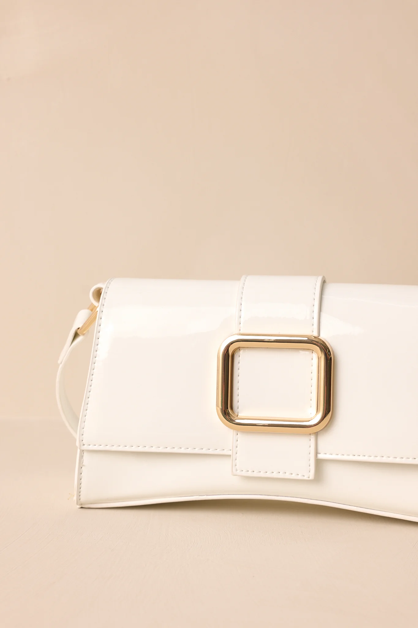 Elegant Allure Ivory Glossy Handbag