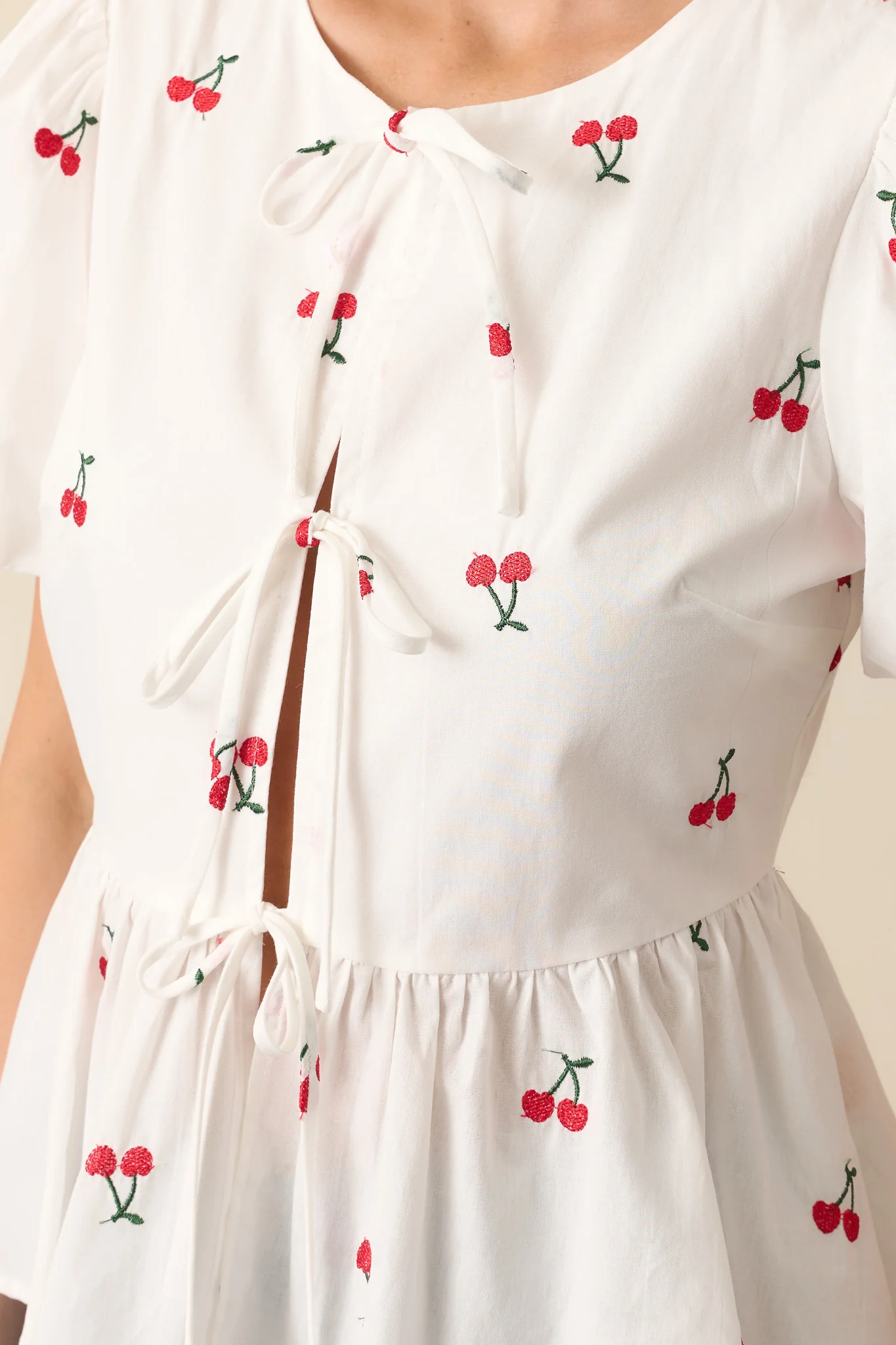 Pucker Up White Cotton Cherry Embroidered Peplum Top