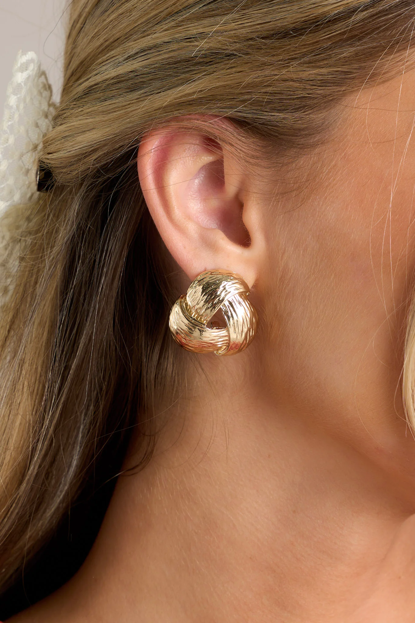 Intertwined Paths Textured Gold Knot Earrings