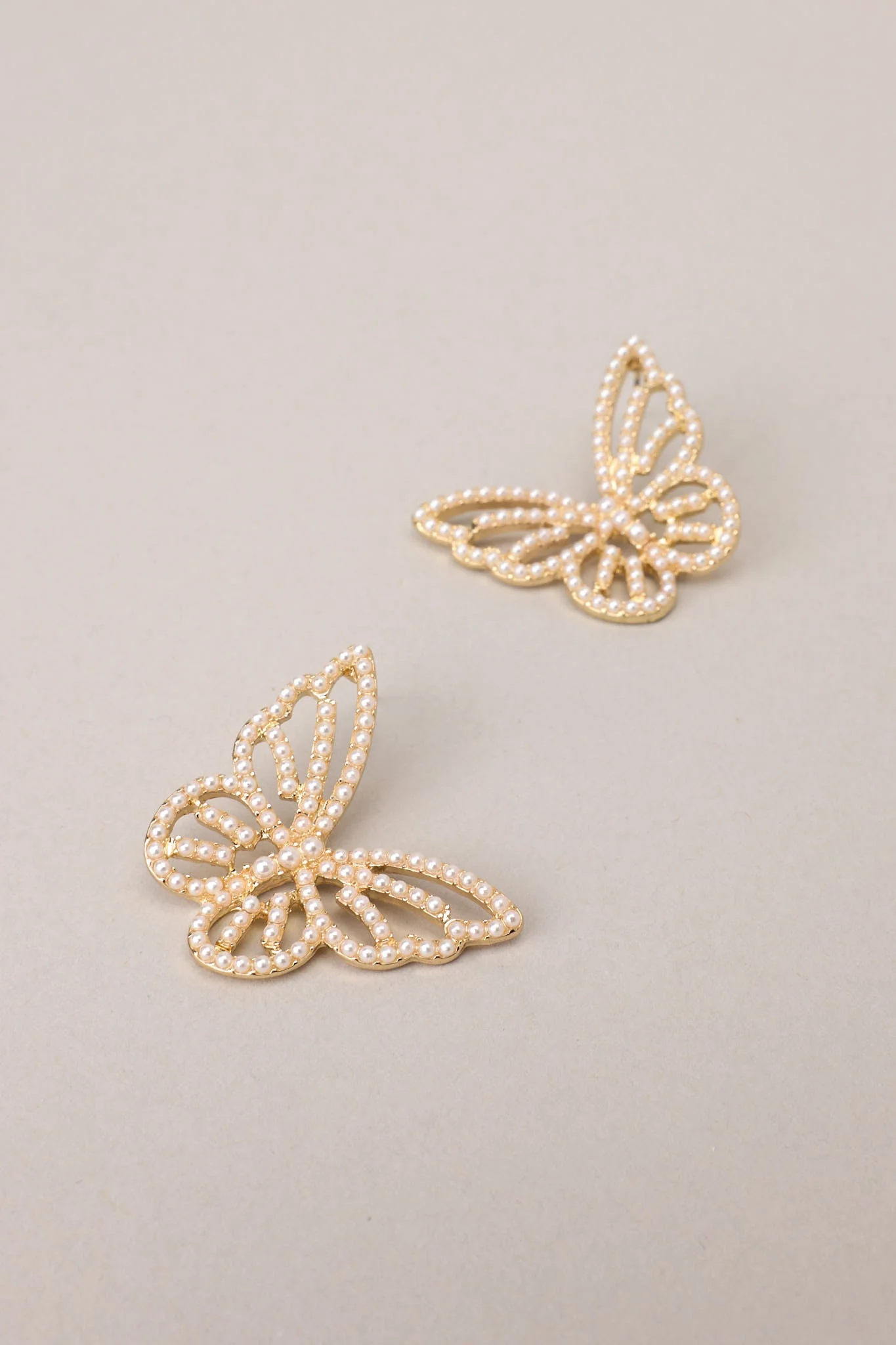 Graceful Flutter Gold Pearl Butterfly Earrings