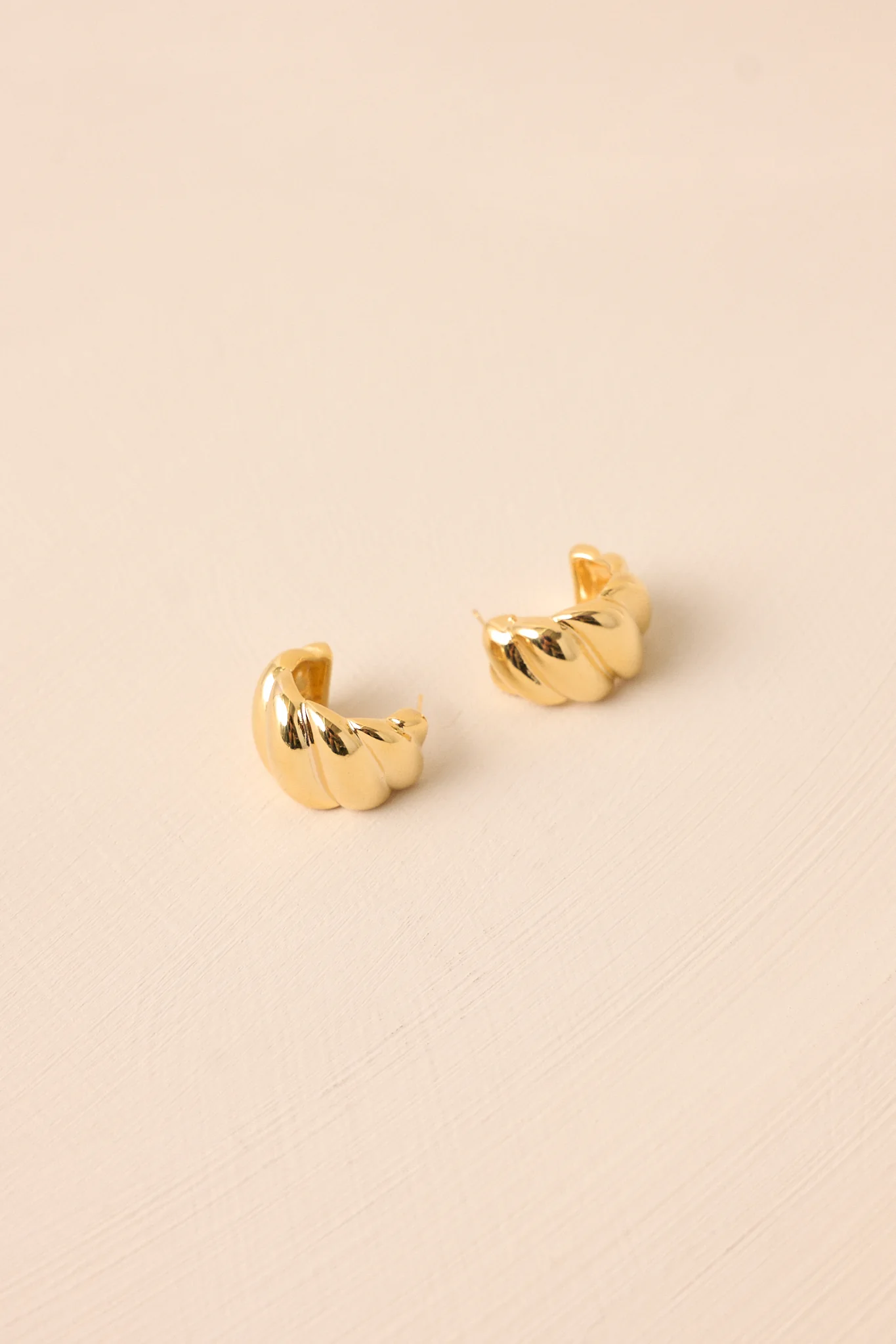 I Will Be Back Gold Twist Hoop Earrings