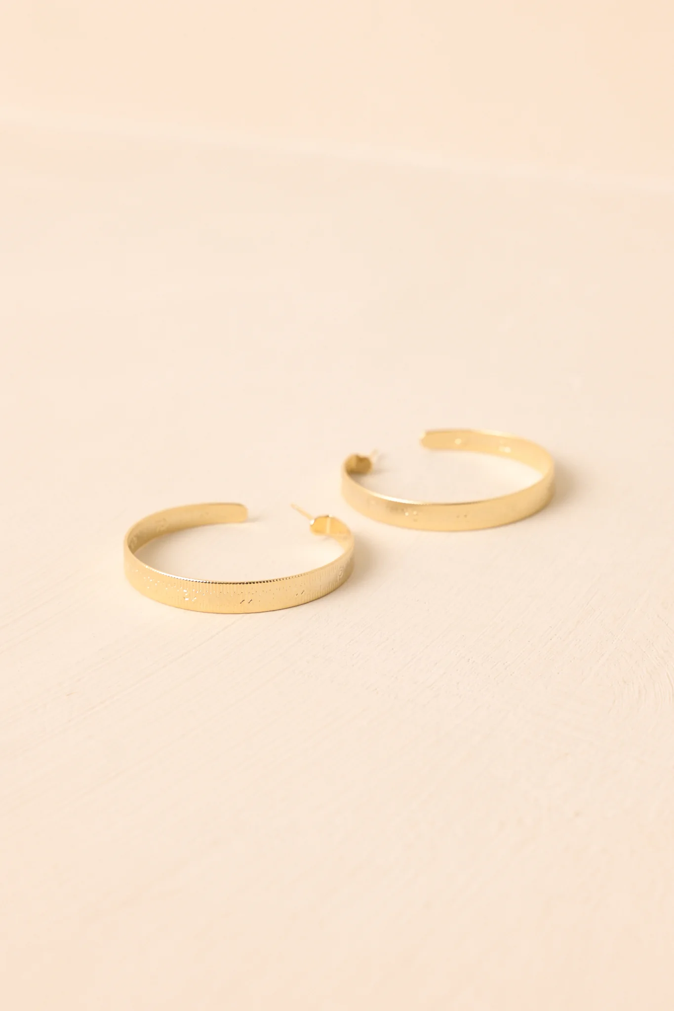 Taking Measurements Gold Textured Ruler Hoop Earrings