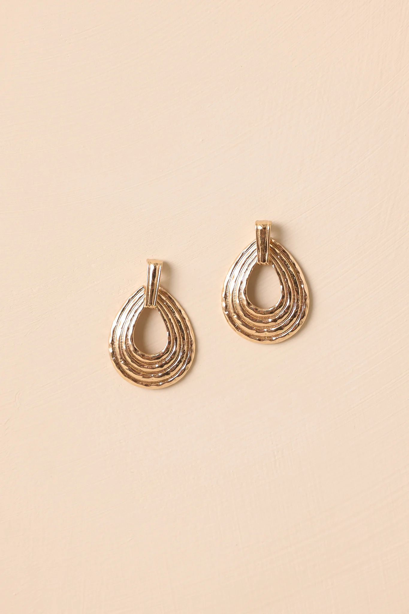 She's Got Plans Gold Textured Oval Drop Earrings