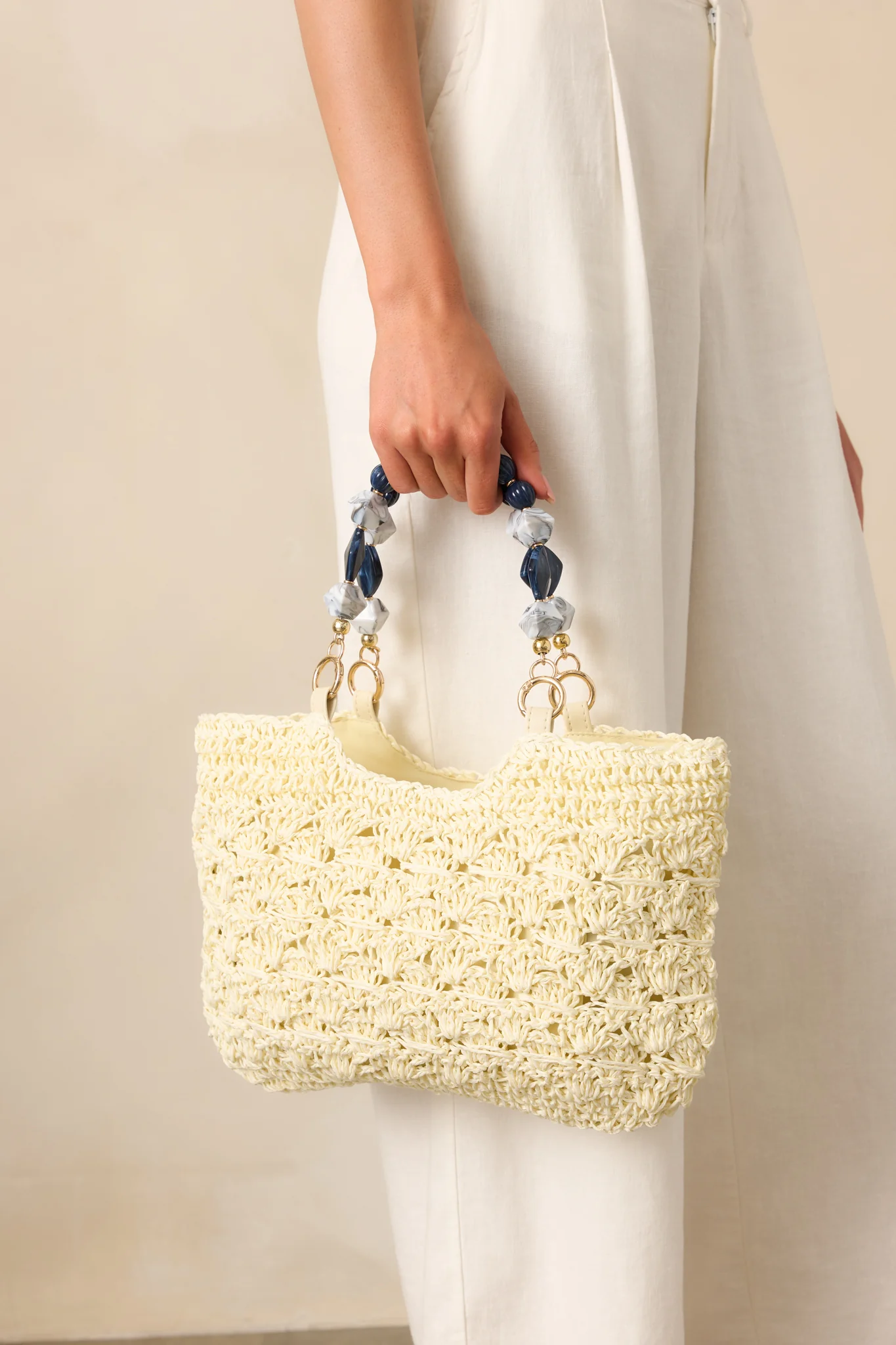 Reflections On The Water Ivory Raffia Woven Handbag