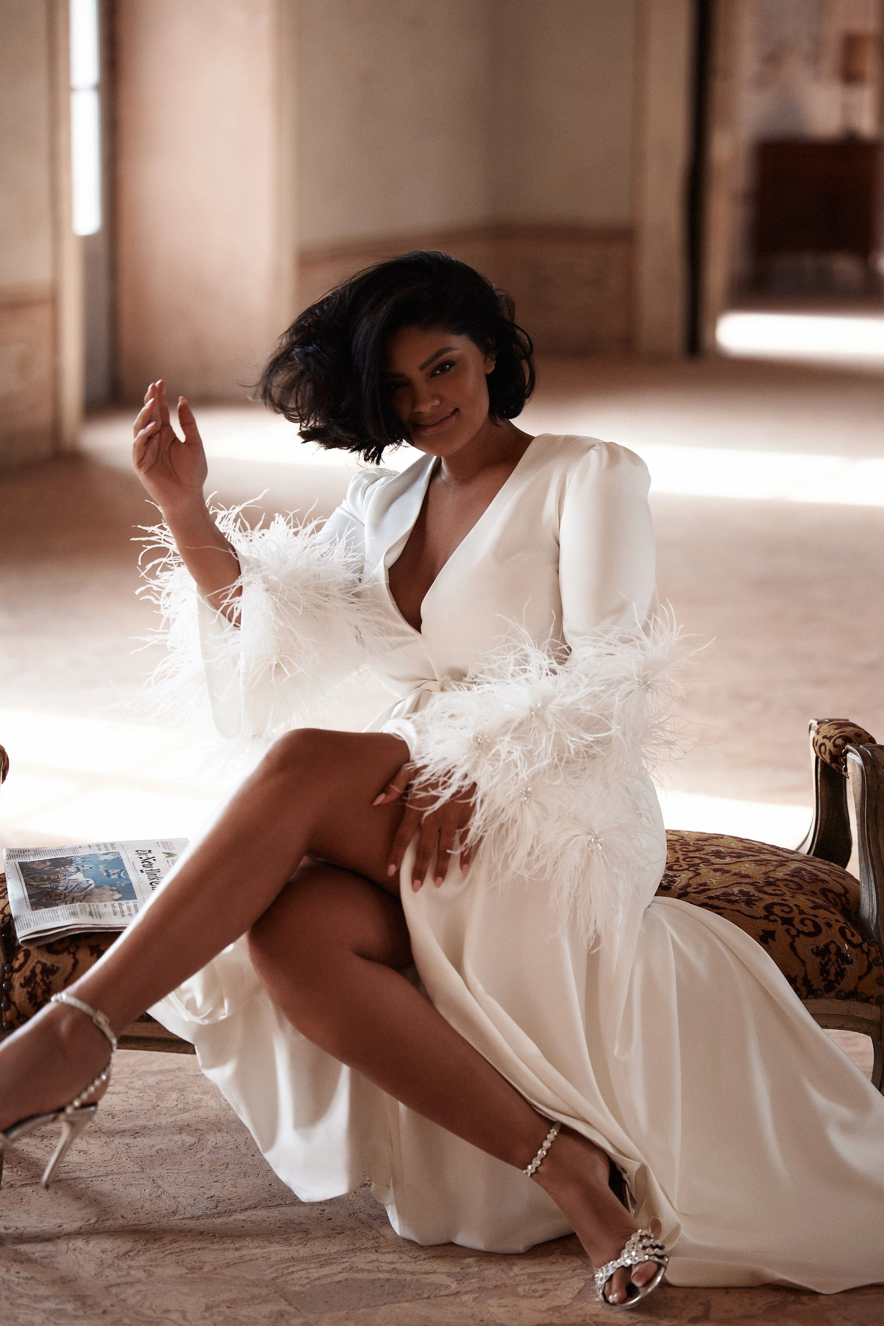 Delicate feather-trimmed satin robe