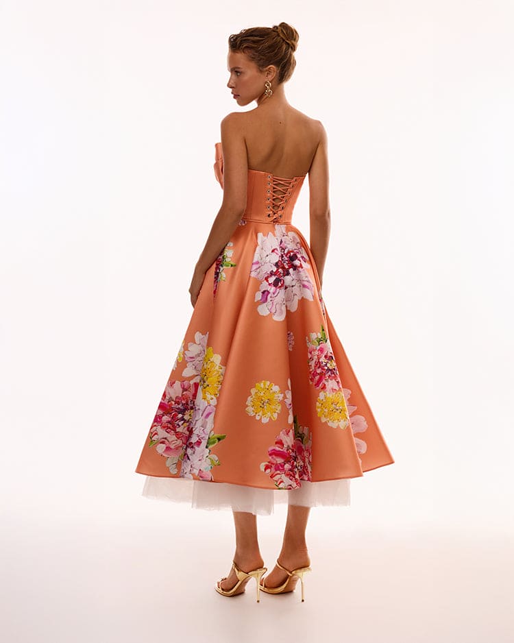 Playful orange floral midi dress with bow, Glow-Up