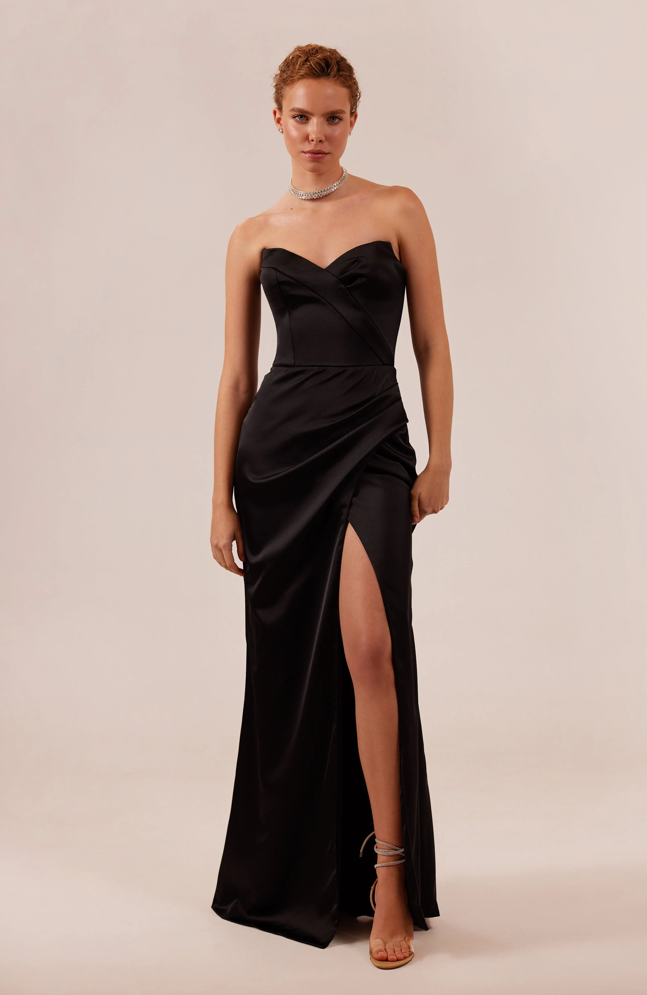 Black Strapless evening gown with thigh slit